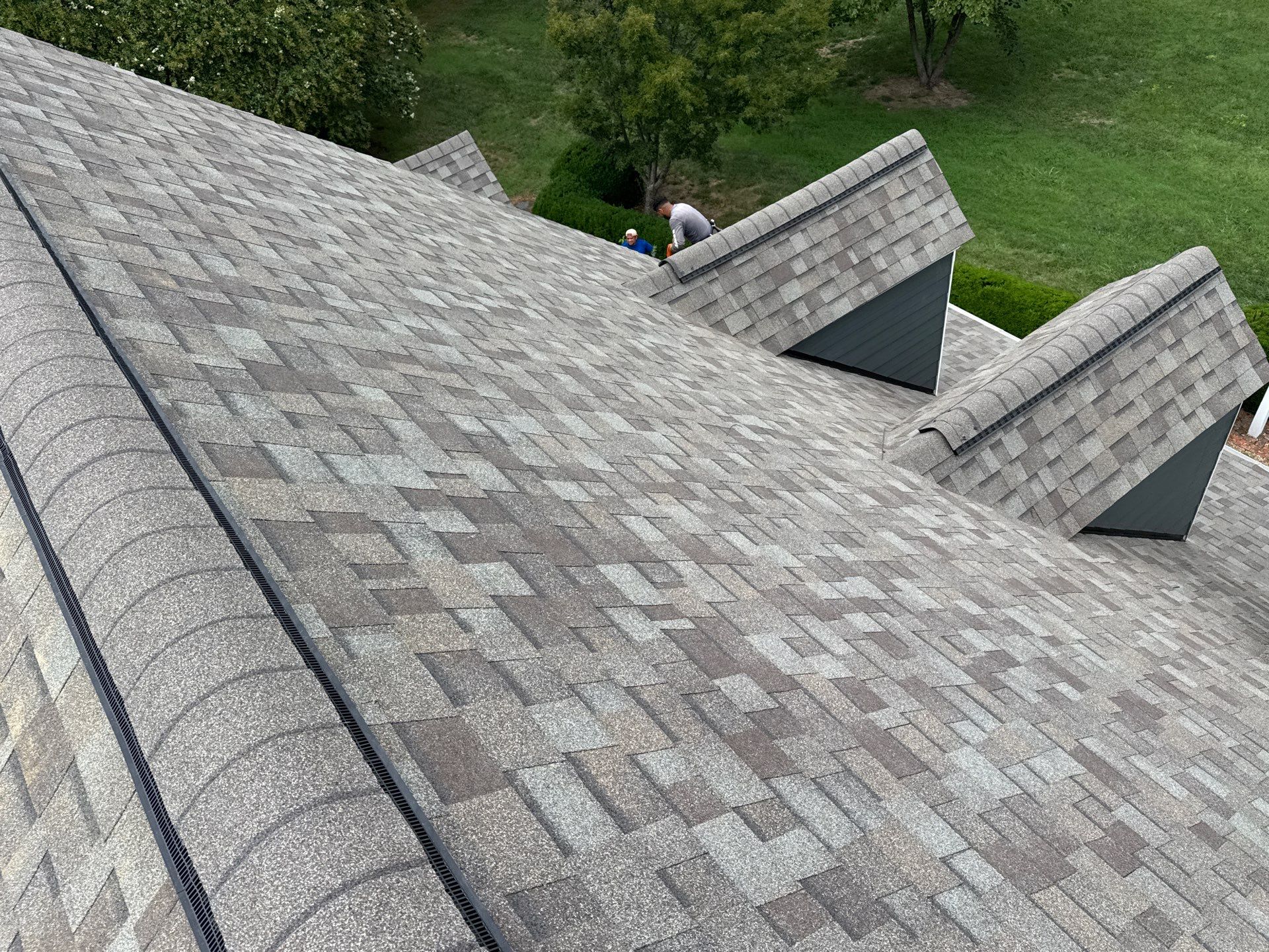 Roof Replacement and White Gutter Installation in Gloucester by Cade Construction