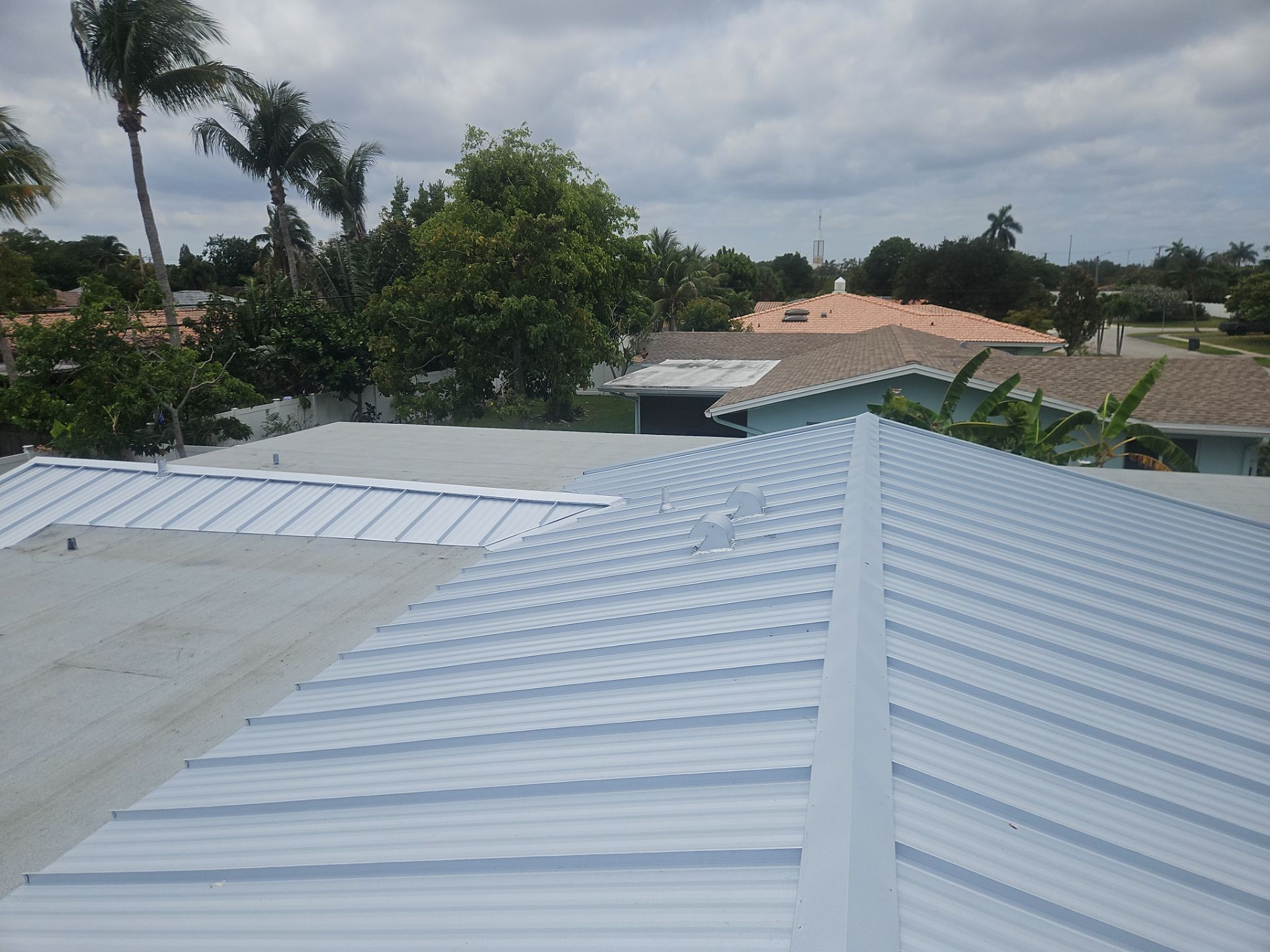 Residential Roofing Installation using 1" Nail strip metal roof by BLUES BROTHERS ROOFING
