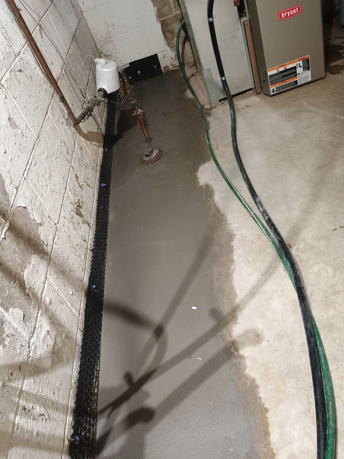 Interior Drain Tile Installation near Columbia Heights, MN by Waterproofing Northeast