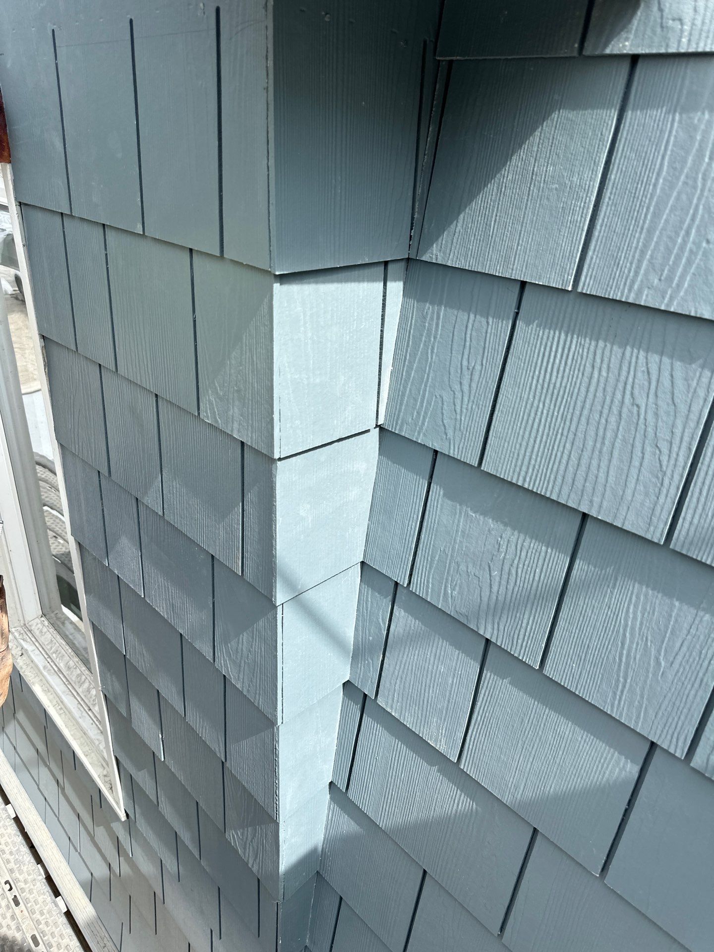 Pre-finish shingles by New Era Siding Inc 