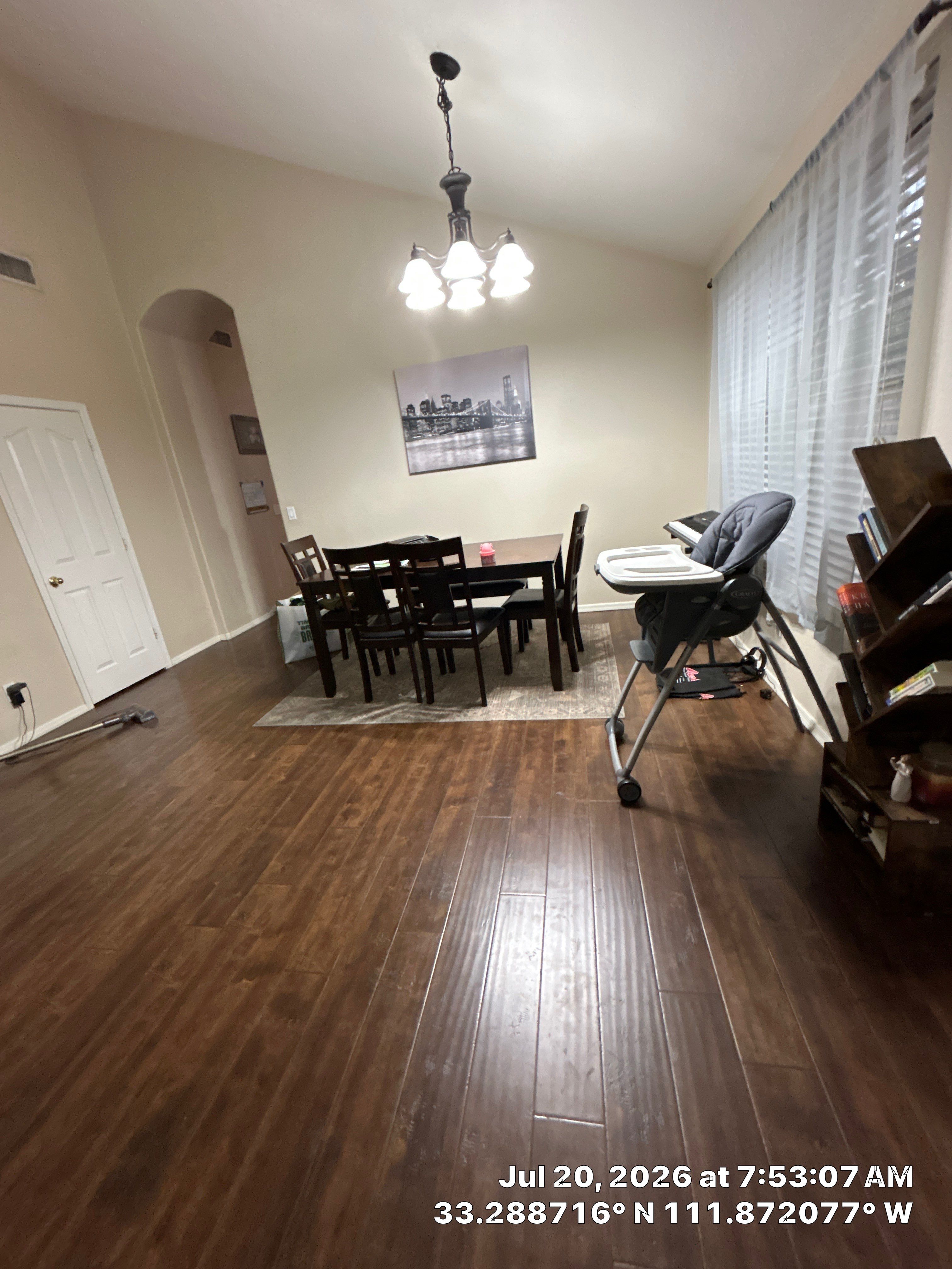 Dark Wood-Look Laminate Flooring Installation in Chandler Dining Room by CompanyCam Sales Demo