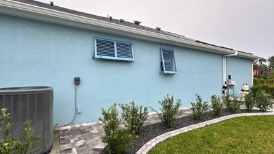 Hurricane Rated Shutters in Pastel Blue