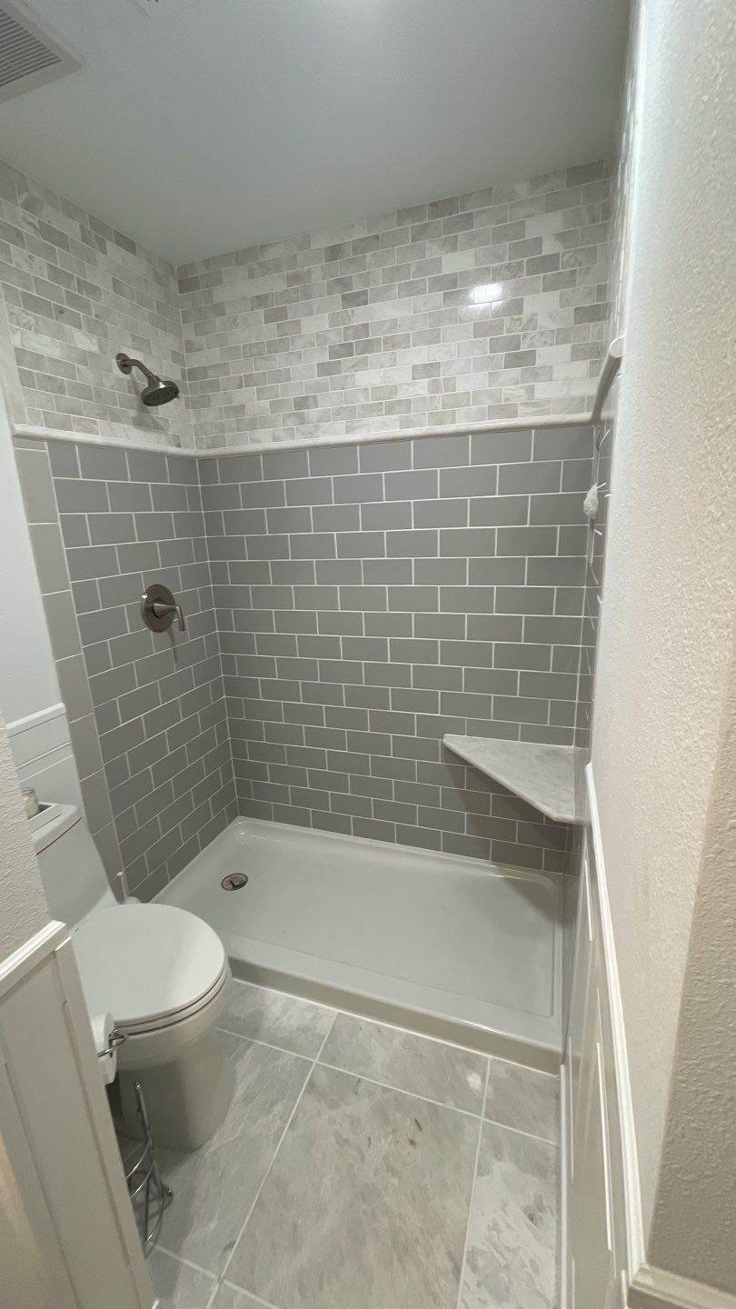 Full Bathroom Remodel by First United Roofing & Construction