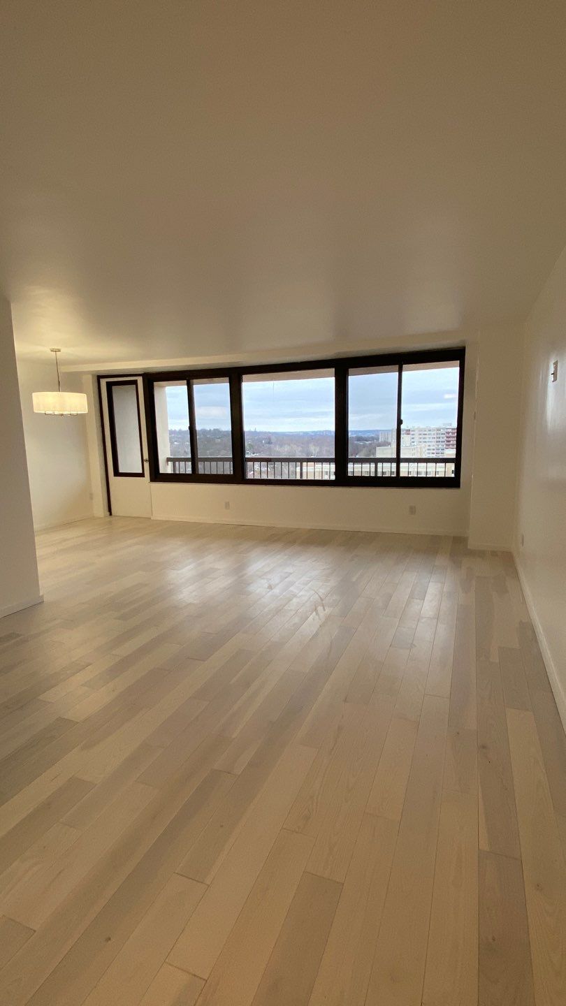 Apartament renovation  using Harwood floor  by Jesus Master Handyman LLC 