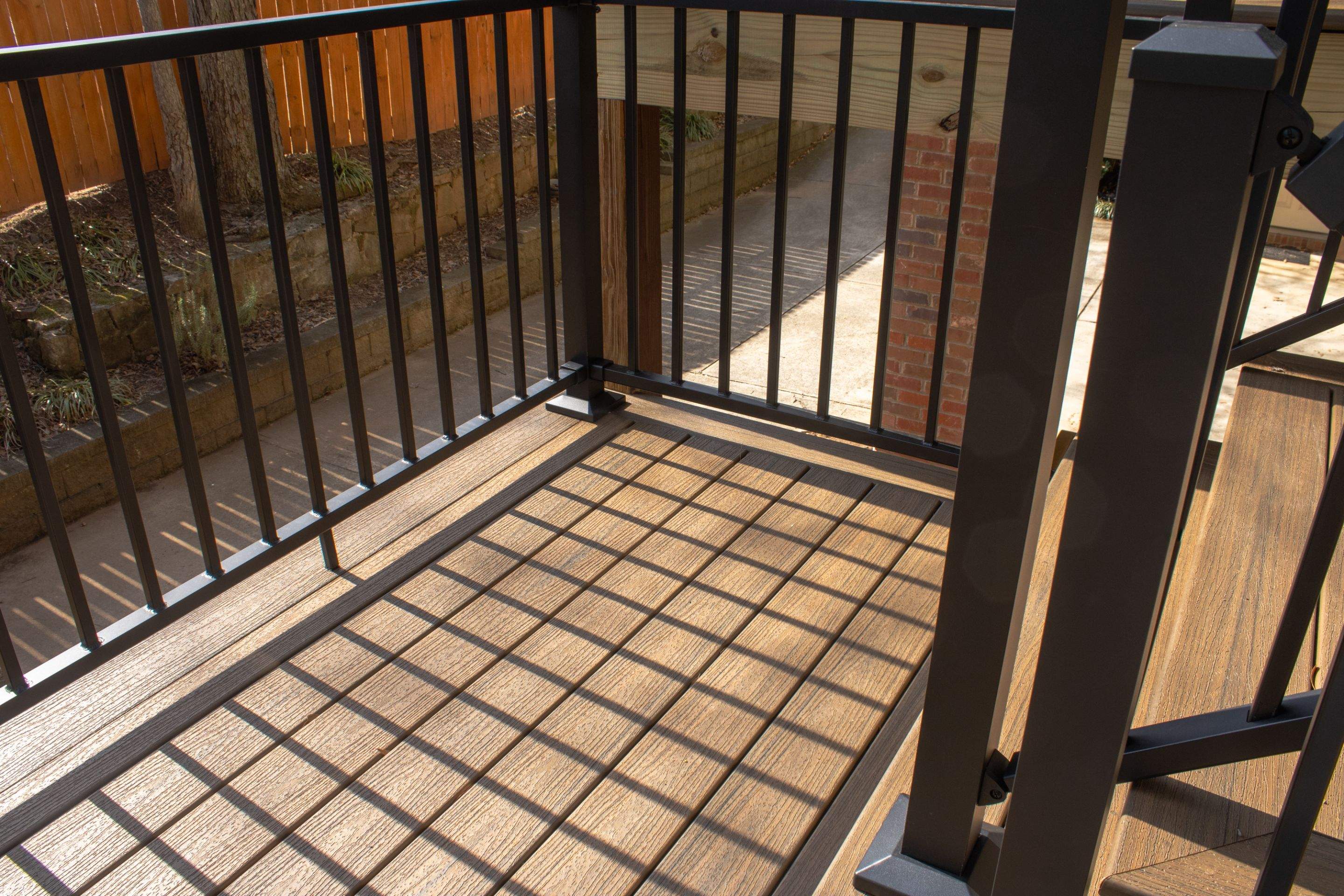 Deck Resurface using Trex and Deckorators ALX Contemporary railing by Nelson Exteriors 