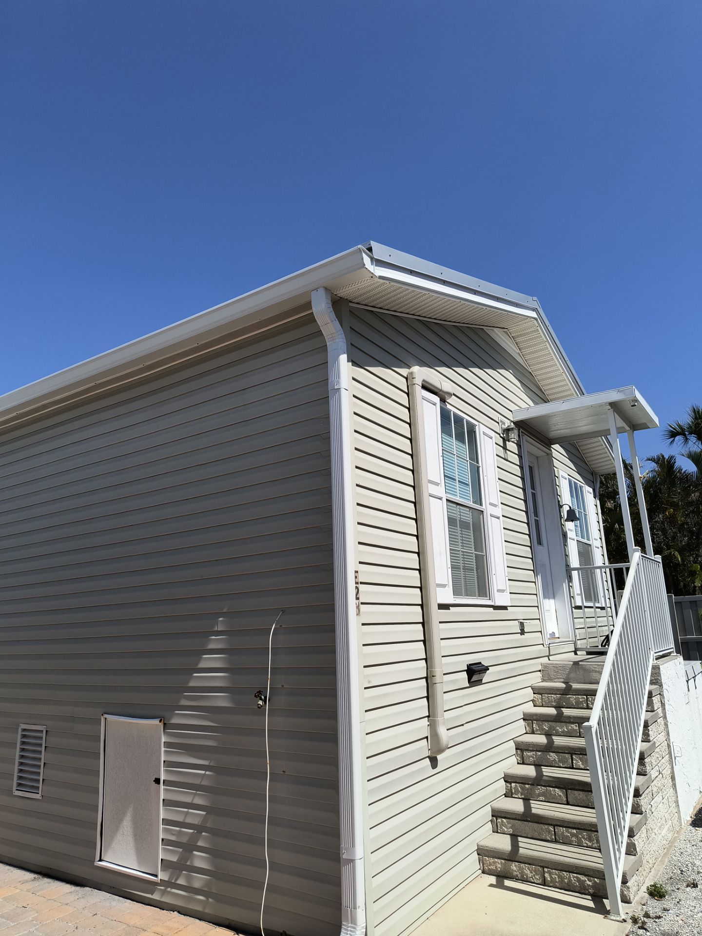 White K-Style Gutters for Beach Homes in Longboat Key FL by Gutter Professors