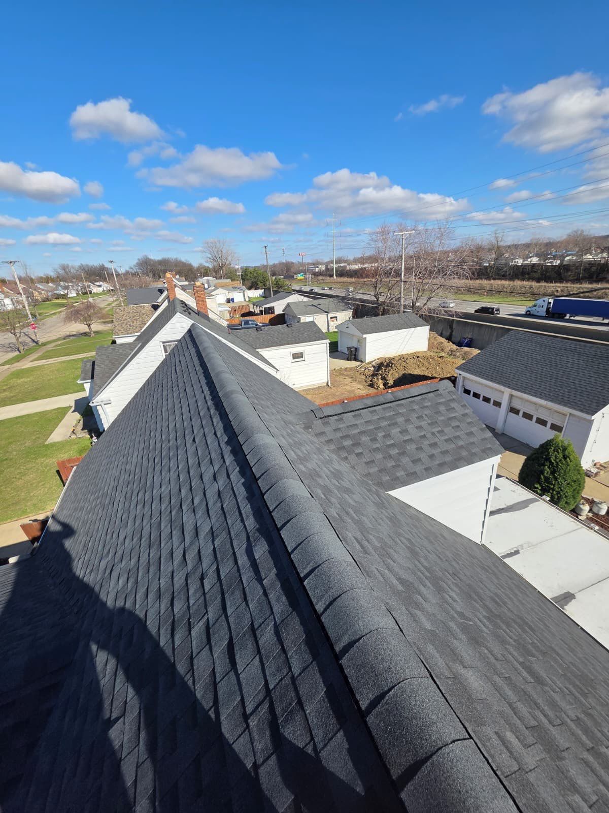 Cleveland Roof replacement - Charcoal shingles by Atlas Roofing & Restoration