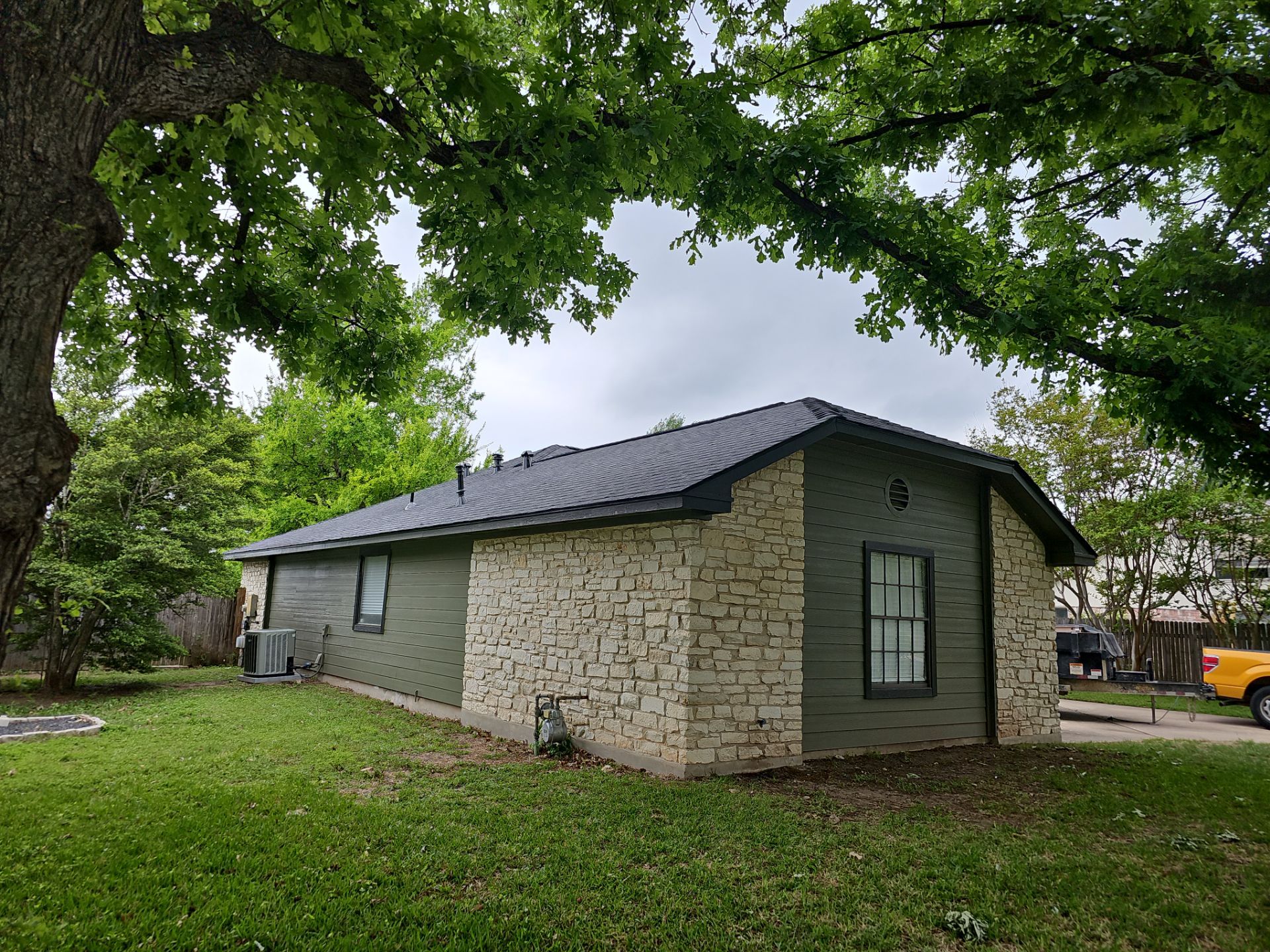 Residential Roofing Installation using Owens Corning Oakridge Onyx Black by DeZign Roofing & Exteriors