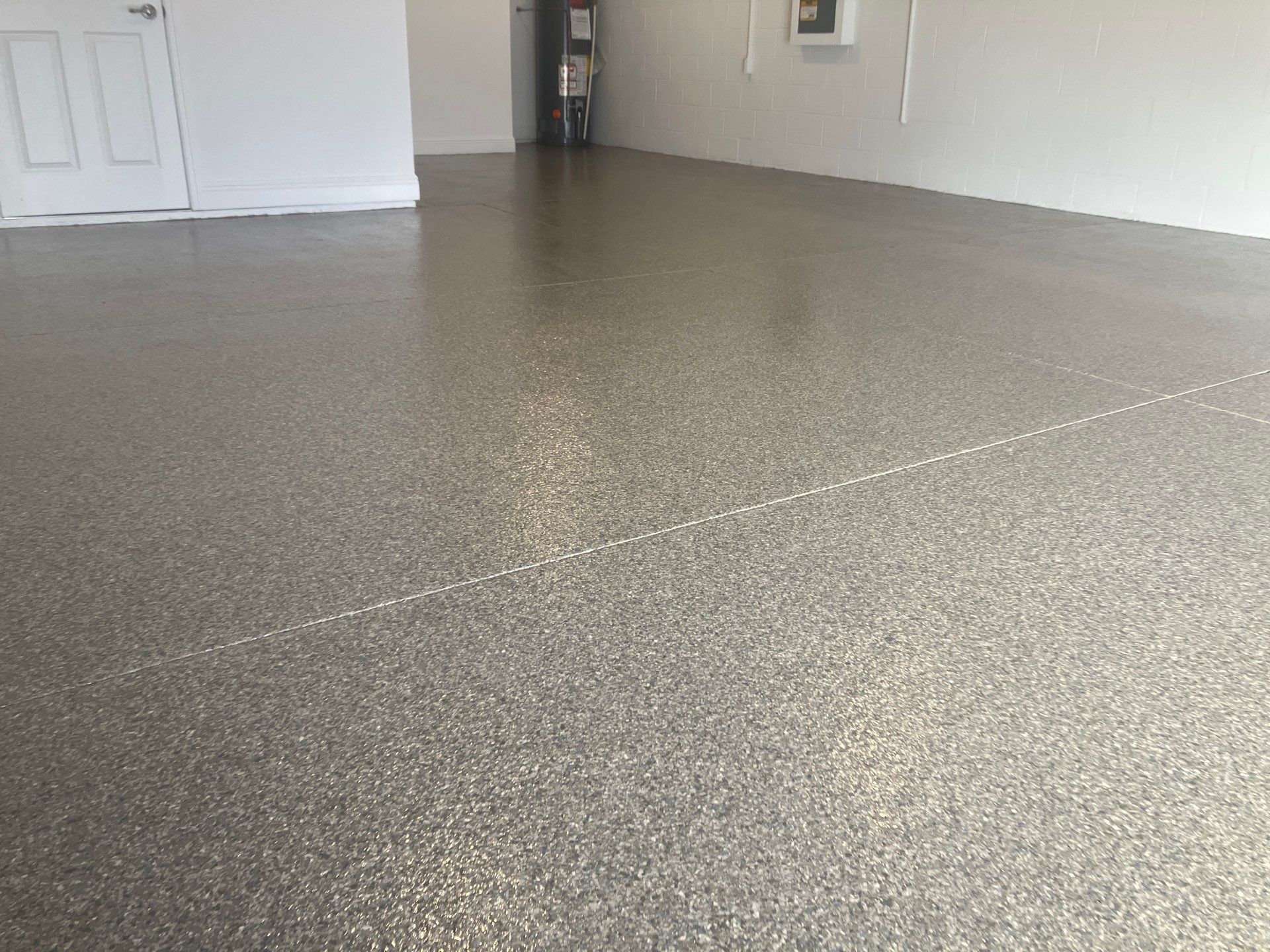 Garage Project in Trailmix by Cross Creek Concrete Coatings