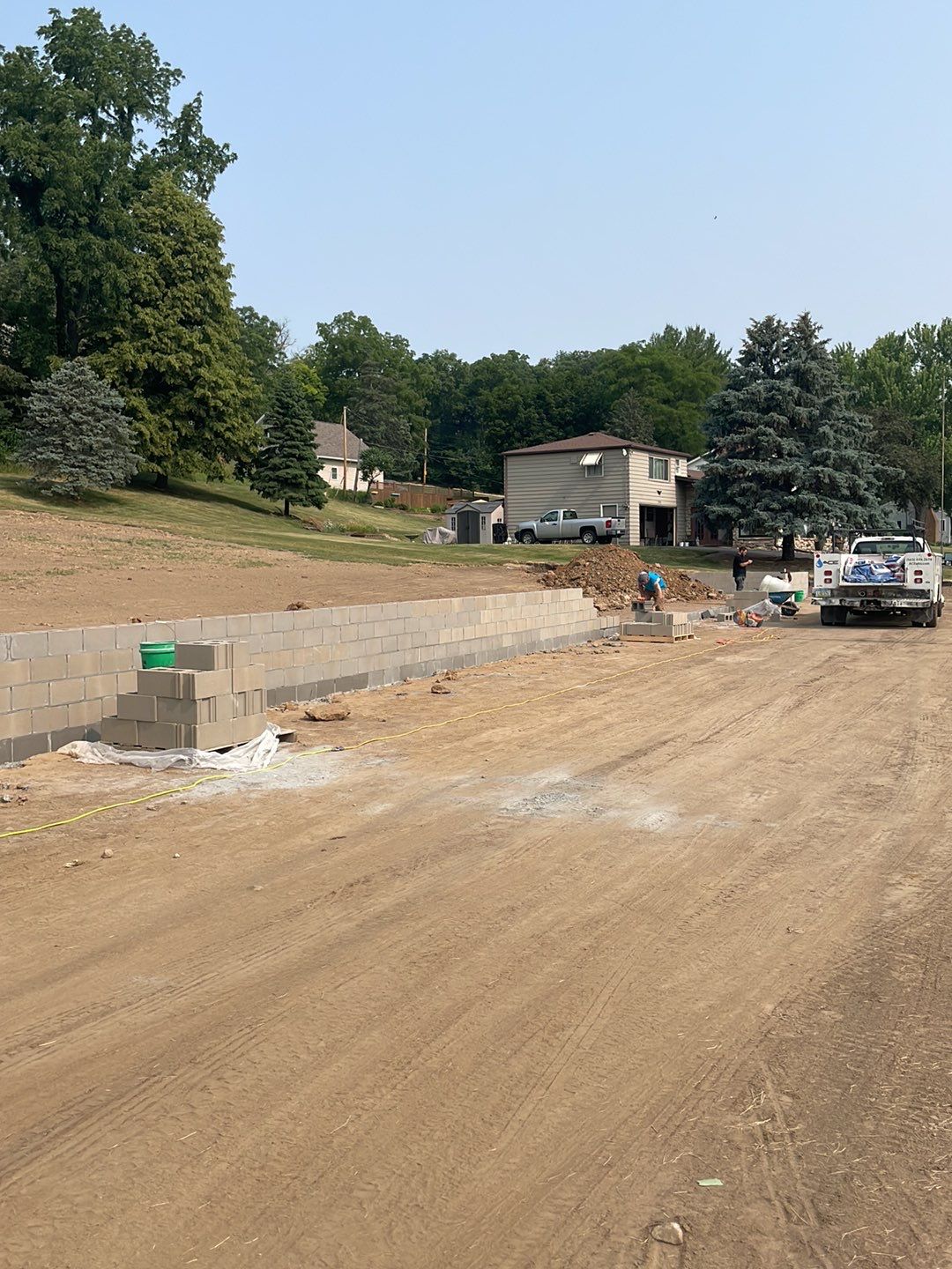 Fence / Retaining Wall using Block then parge by ACE Waterproofing & Basement Solutions