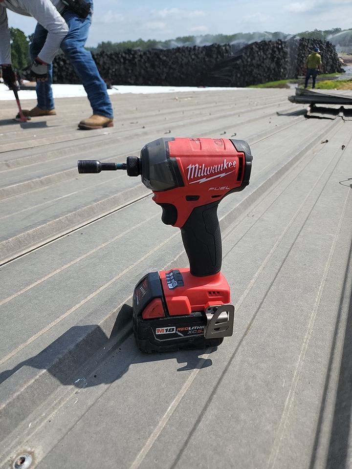 Commercial Roofing Installation using Aluminum Roofing panels by Hostetler Roofing