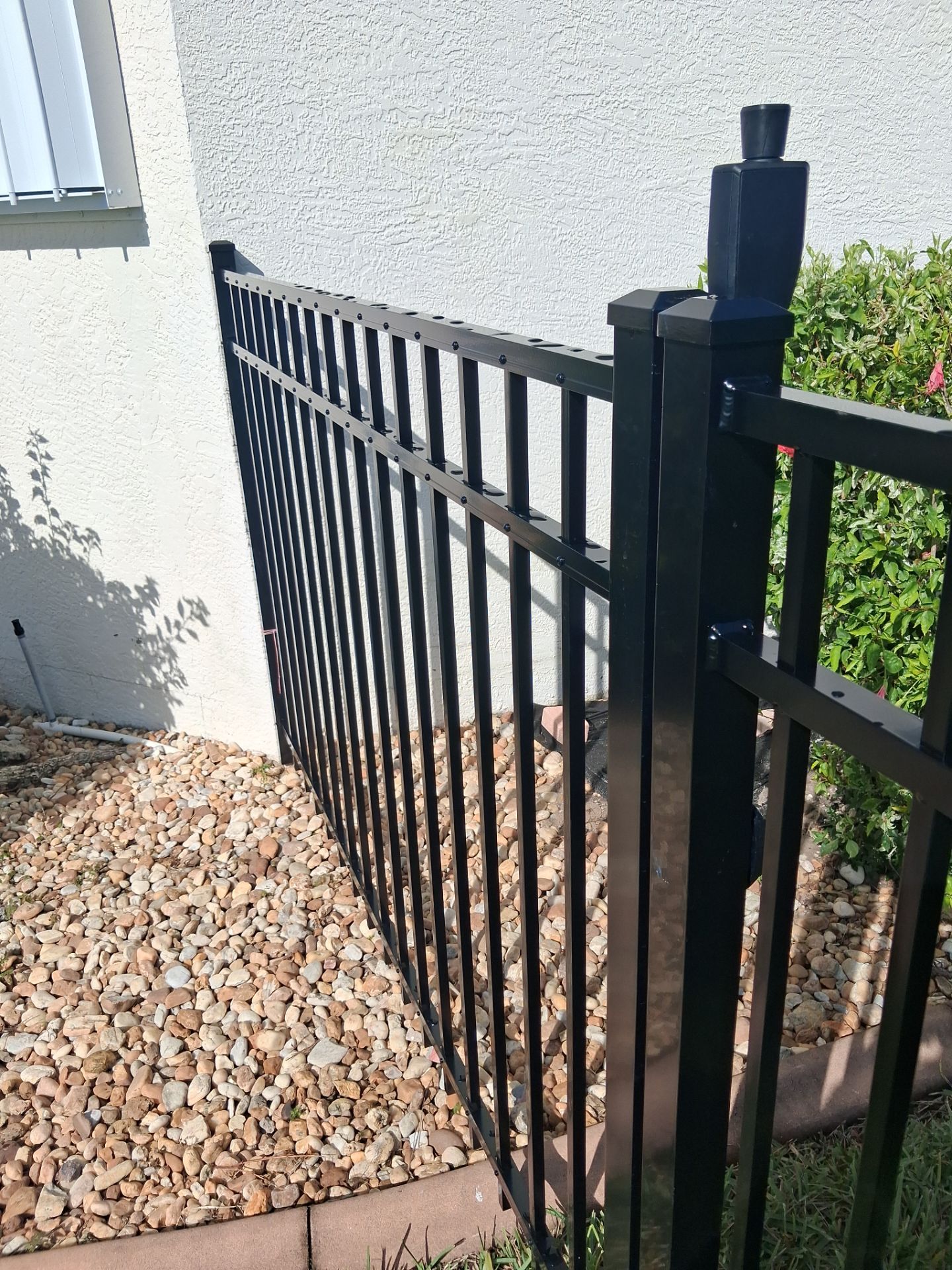 Custom Black Aluminum Fence Enclosure for Punta Gorda Waterfront Property by True Fence LLC