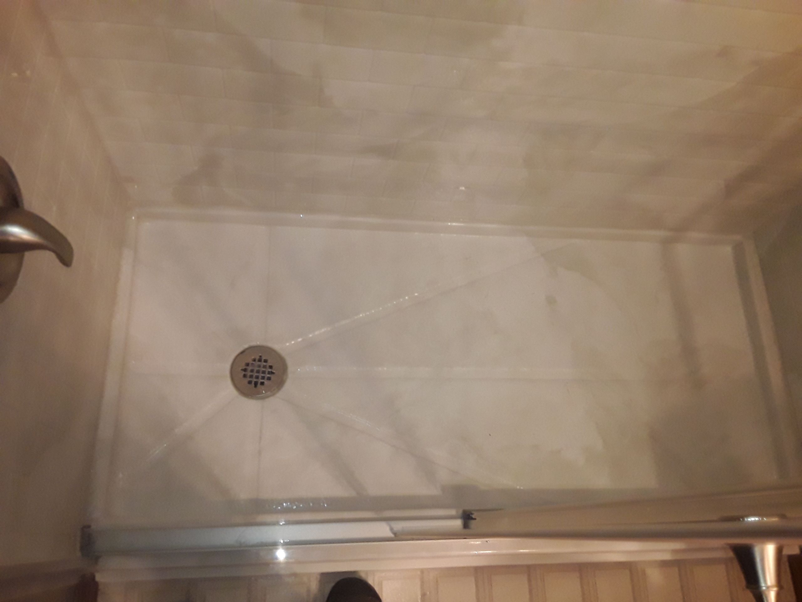 Tub to Shower Conversion using BCI Acrylic Shower System by Secure Construction Company Inc