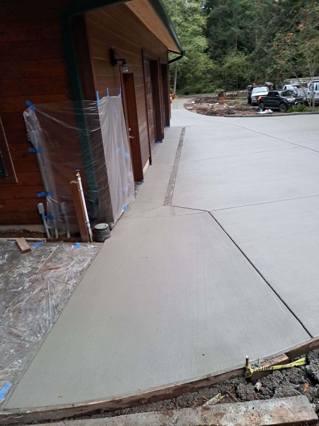 Pia | Custom Concrete Driveway, Walkway & Floating Steps by Jireh Asphalt & Concrete Inc 
