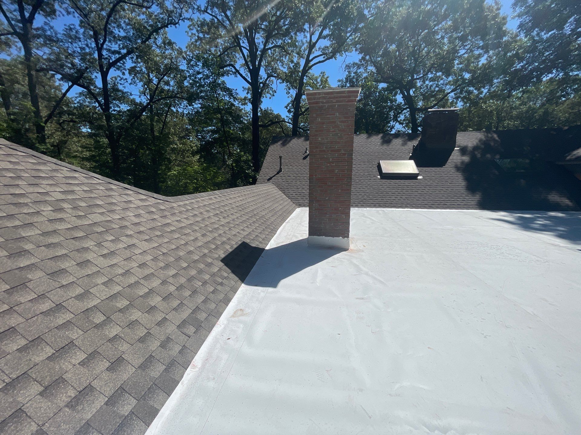 Residential Roof Replacement and Flat Roof Membrane in Memphis by Revival Roofing Services