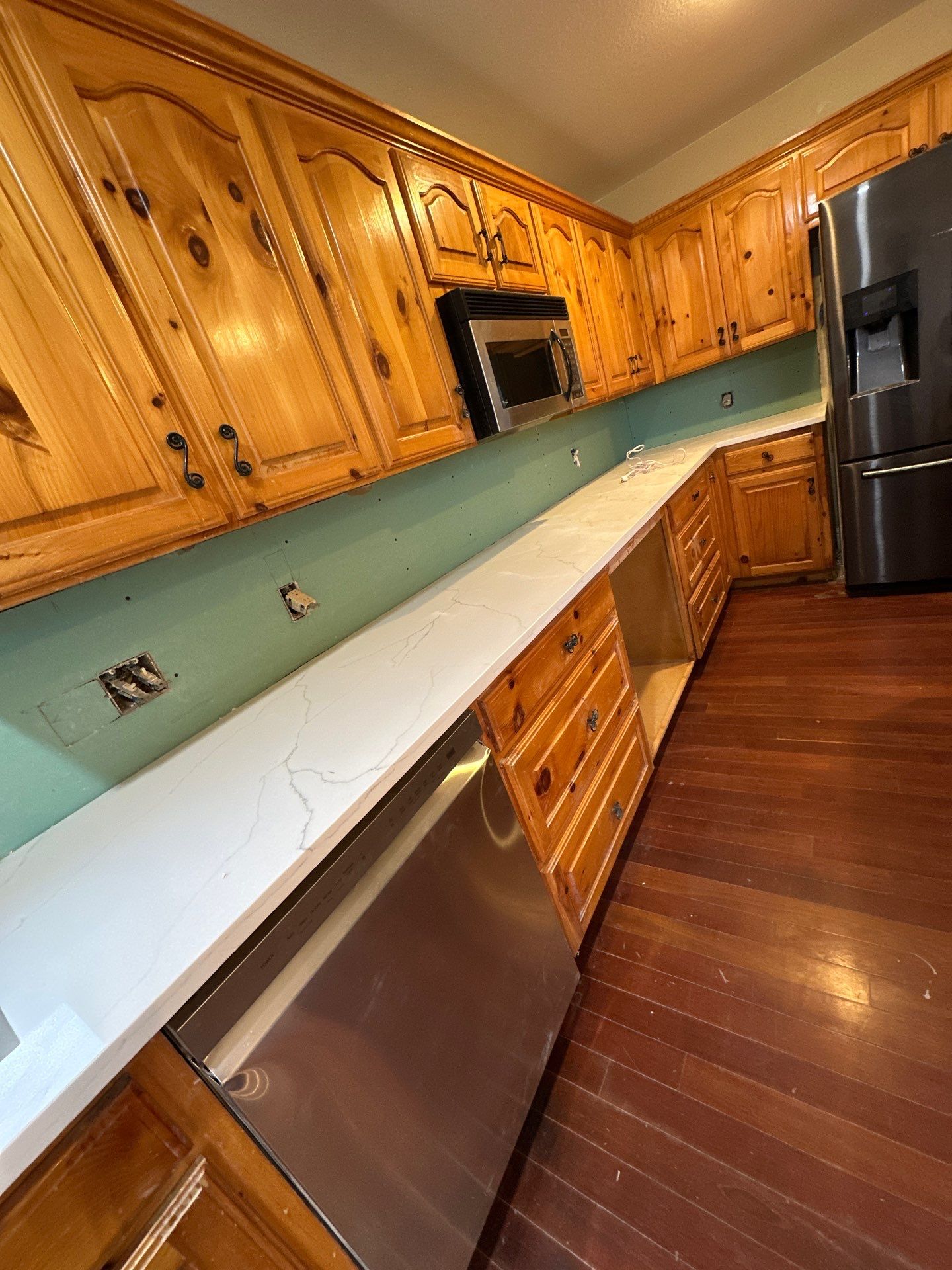 Cabinet Installation using Cabinetry by NORTH TEXAS RESTORATION
