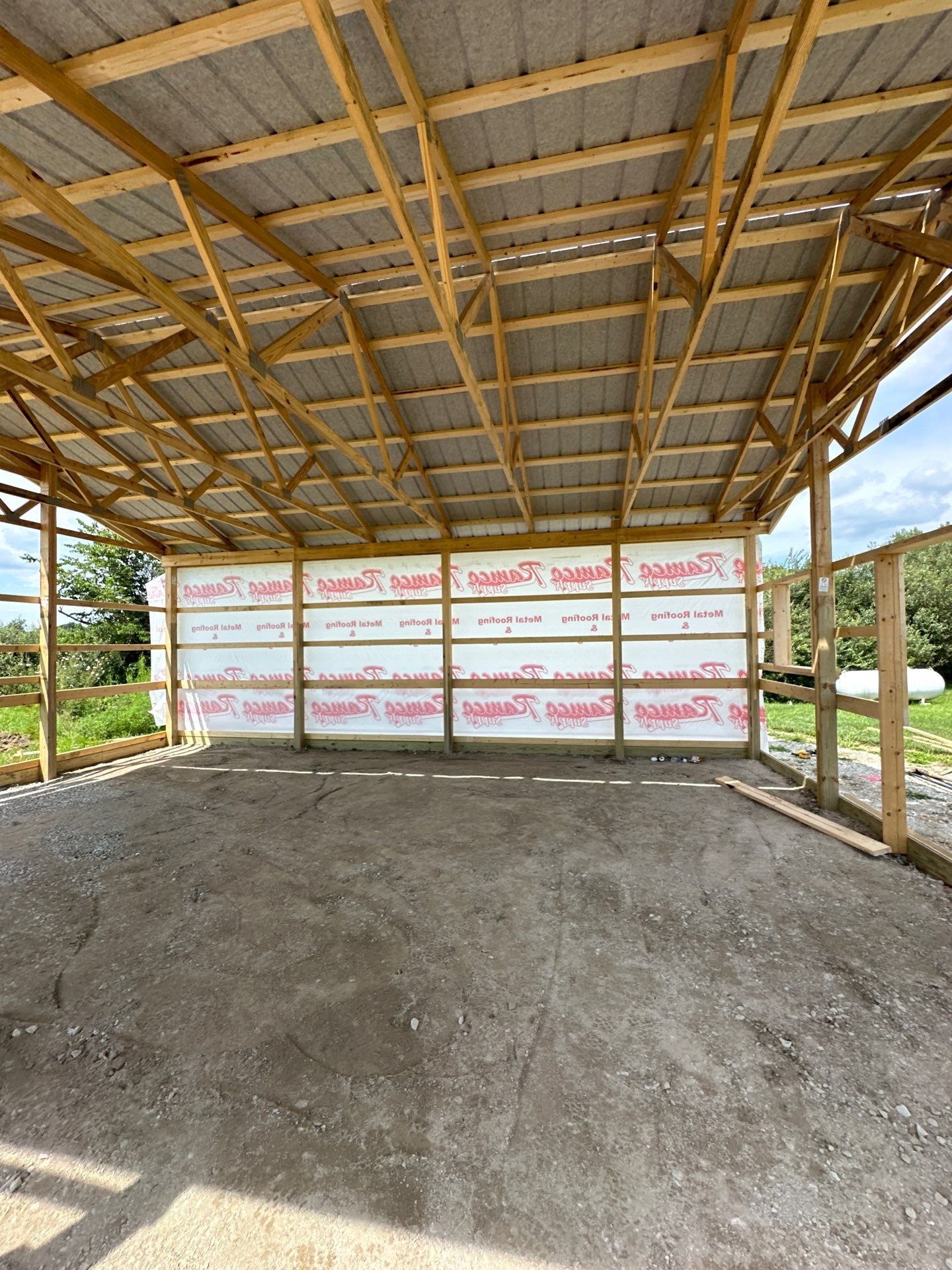 Custom Post-Frame Pole Barn with Concrete Floor in Greenfield by The Barn Builders