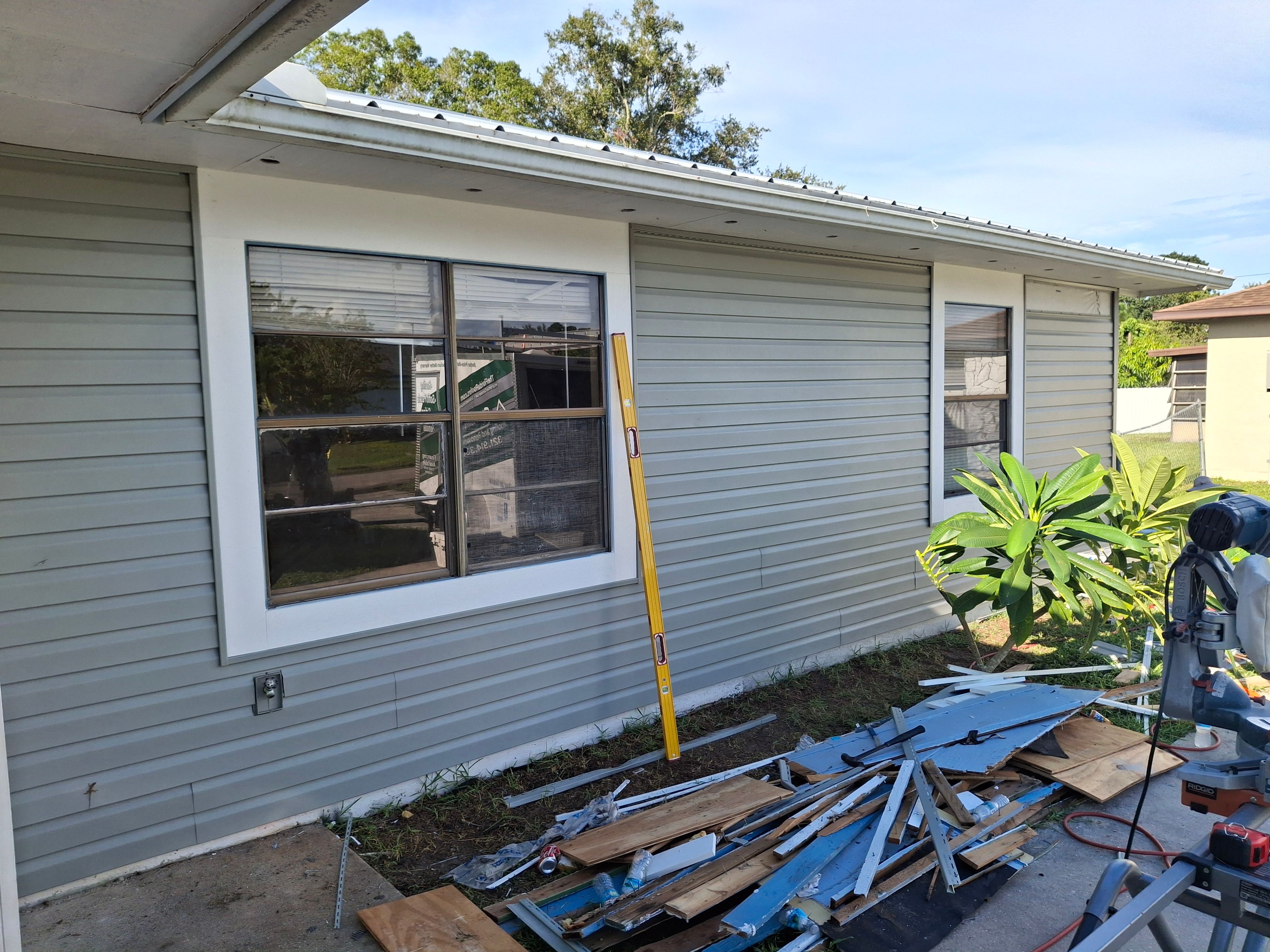 Vinyl Siding Installation and Structural Wood Rot Repair in Palm Bay by Florida Roofing and Renovations Inc.