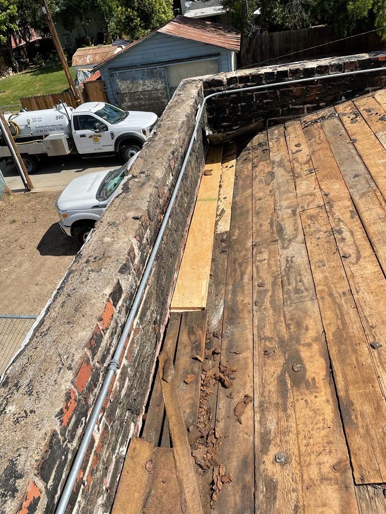 Commercial Roofing Installation using Conklin BenchPly system with PUMA top coat (imbedded fabric system) by Straight Edge Roofing Inc