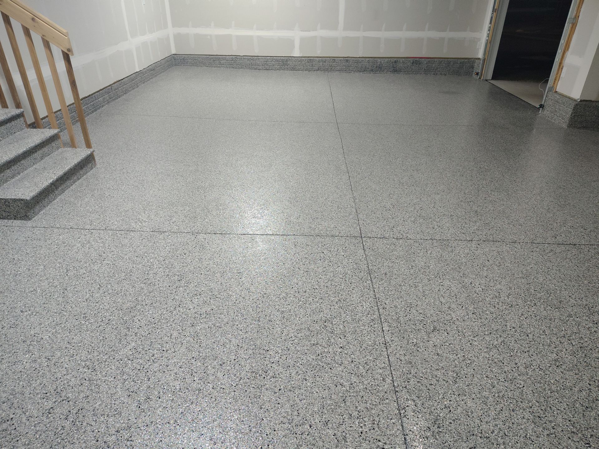 Adel, IA Garage: Complete Keystone Wrap on Floors, Stairs, and Stem Walls by Revival Concrete Coatings