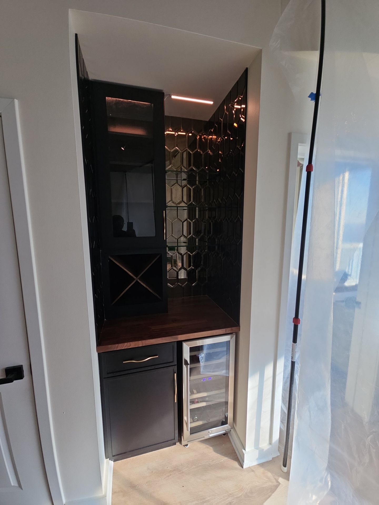 Dry Bar and Kitchen Countertop Conversion by Ajayi Design and Construction 