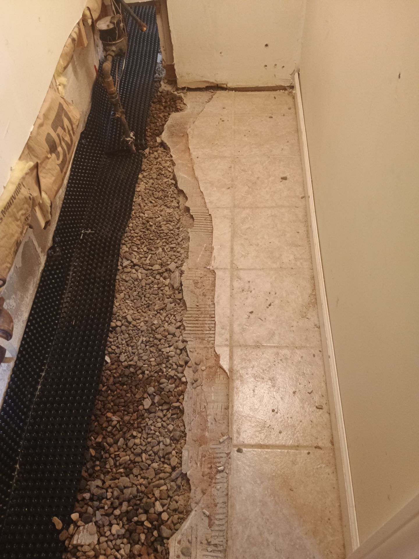 Drain Tile in Minneapolis for Kristen & Taylor by Waterproofing Northeast
