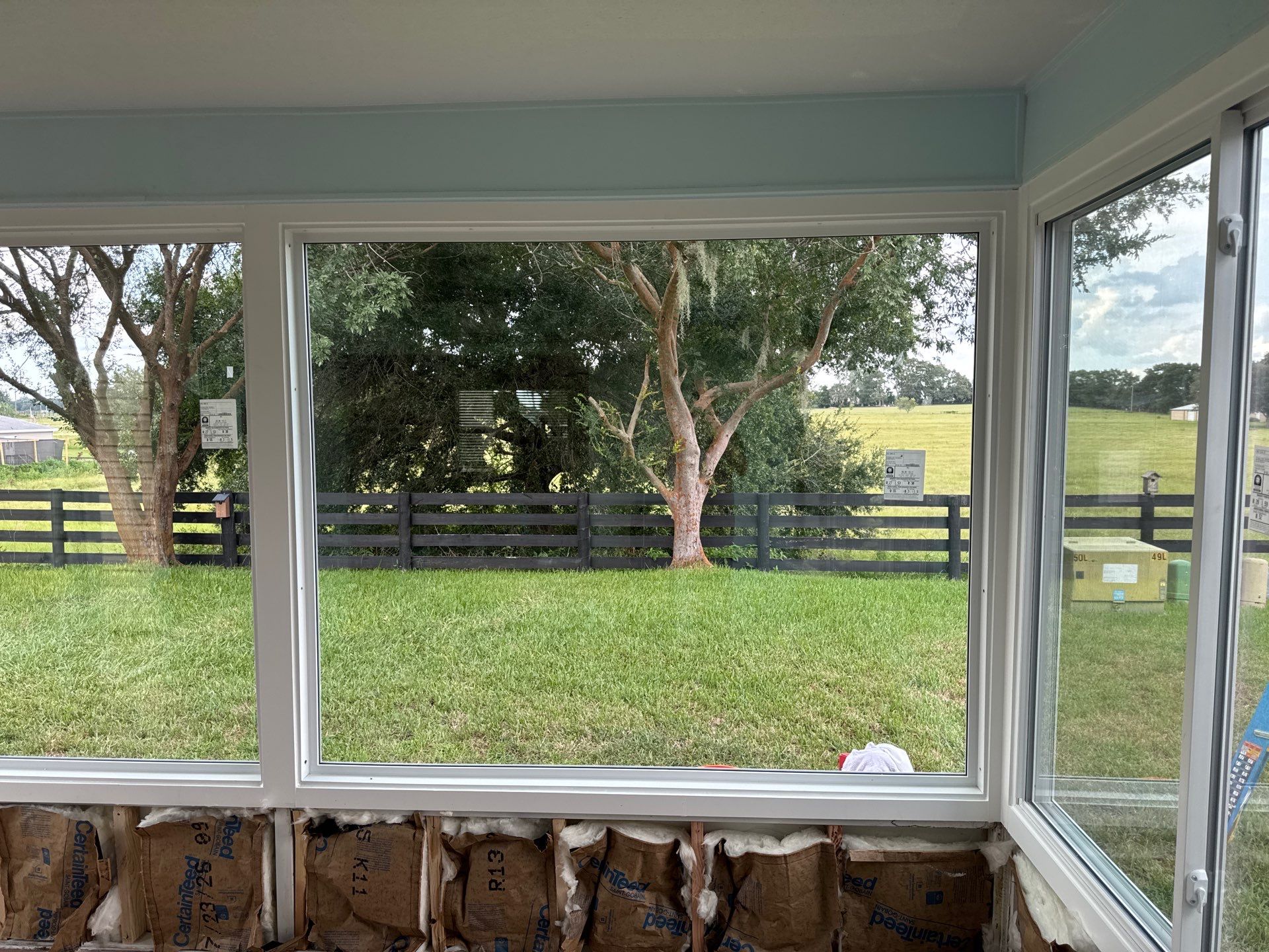 Sunroom Conversion with Alside Windows and Provia Door in The Villages by Windows & Doors Store