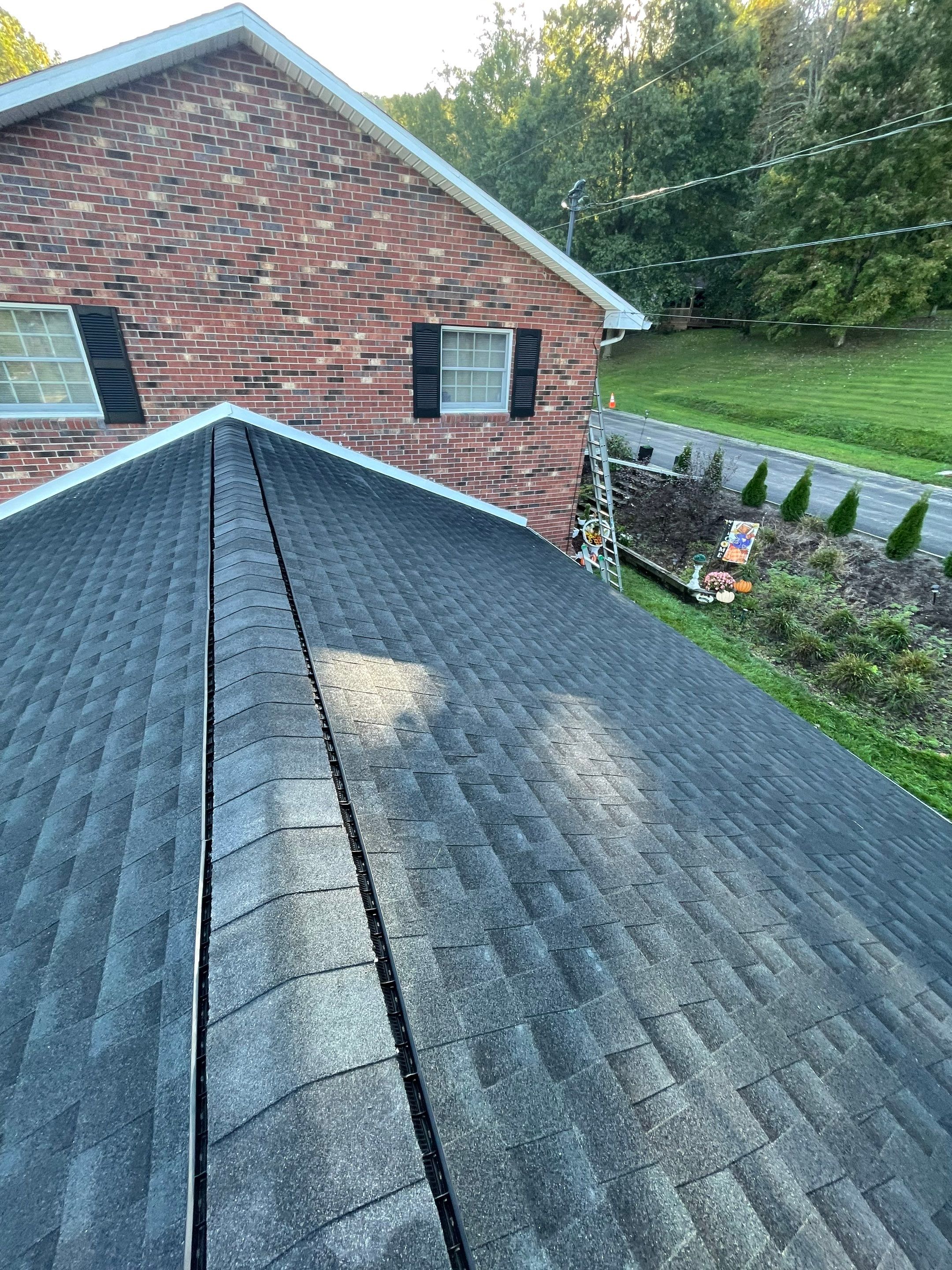 Residential Roofing Installation using GAF Timberline HDZ, Black by Rainstoppers Roofing