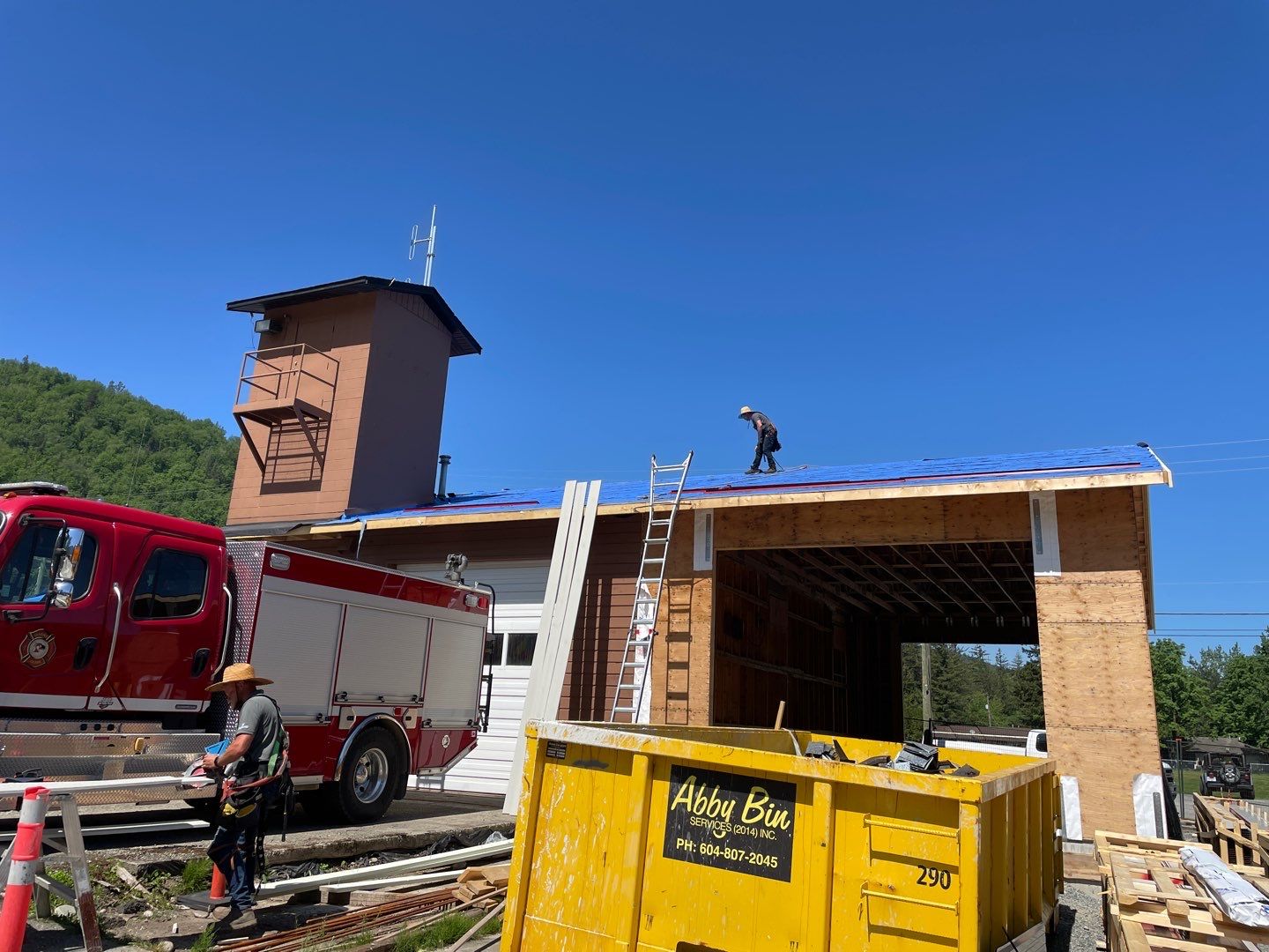 Commercial Roofing Installation using 12" Prolok metal  by Top Notch Roofing Inc