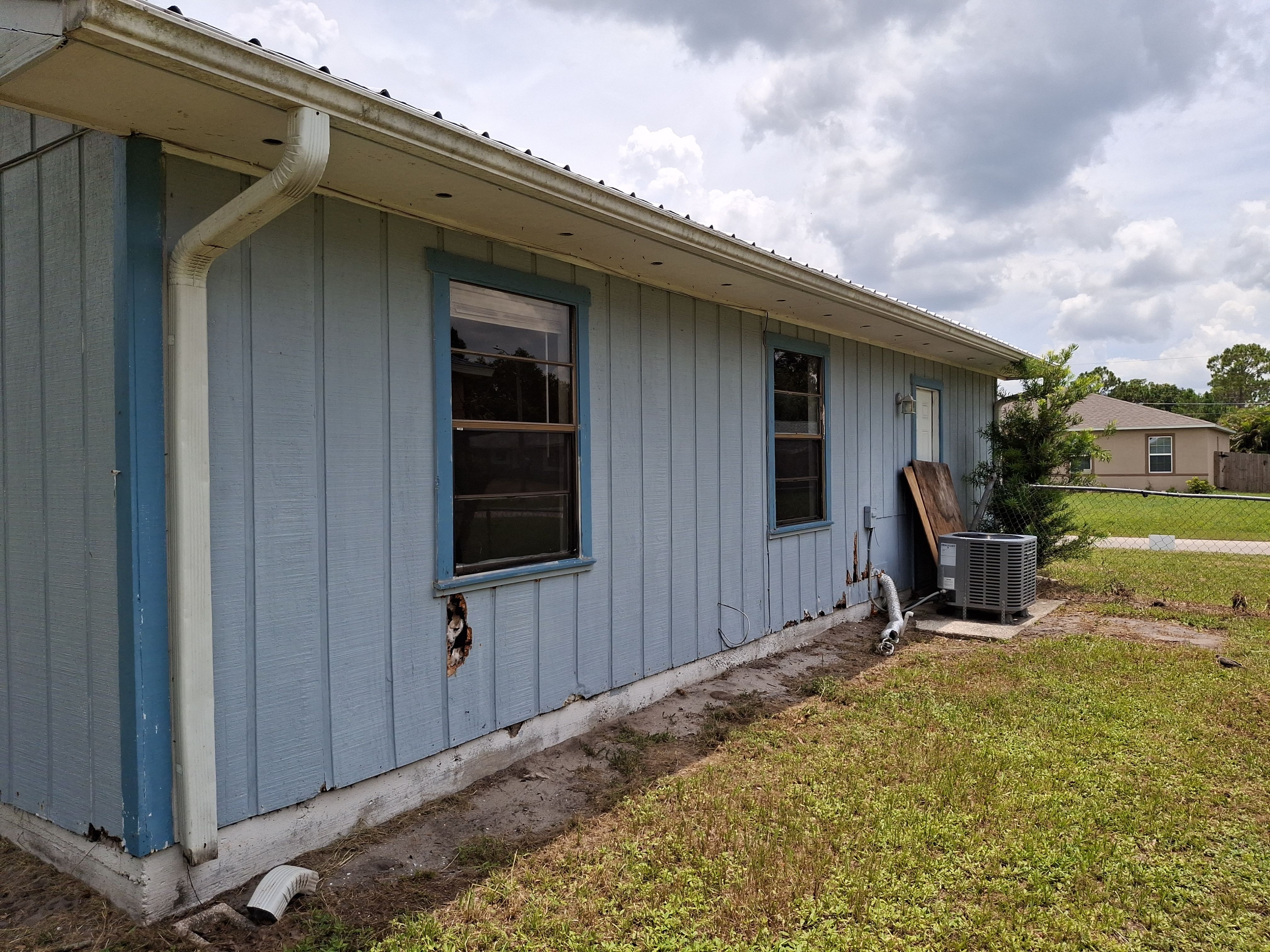 Vinyl Siding Installation and Structural Wood Rot Repair in Palm Bay by Florida Roofing and Renovations Inc.