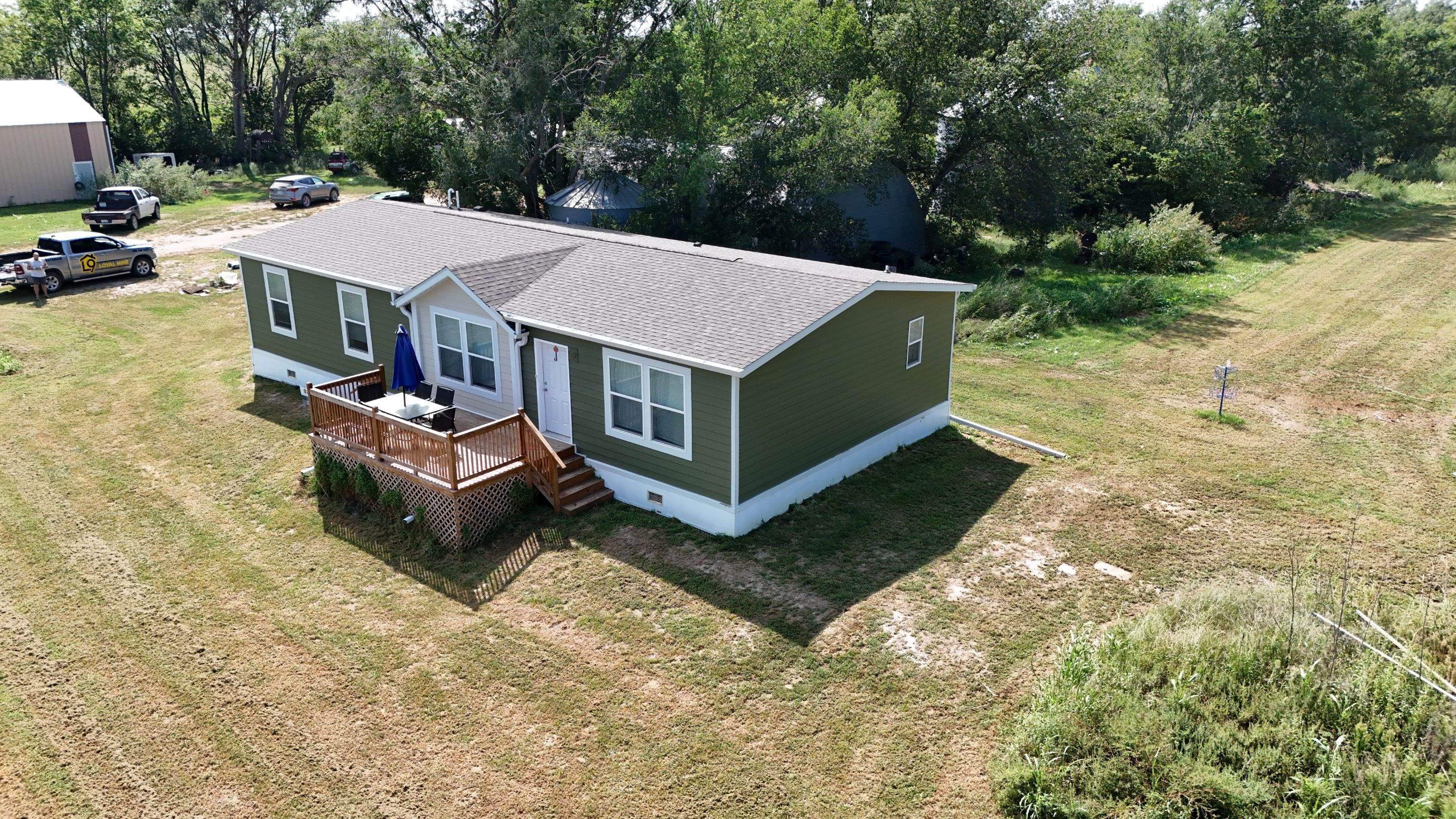 Riverdale Exterior Transformation | TAMKO Roofing & James Hardie Siding by Loyal Nine