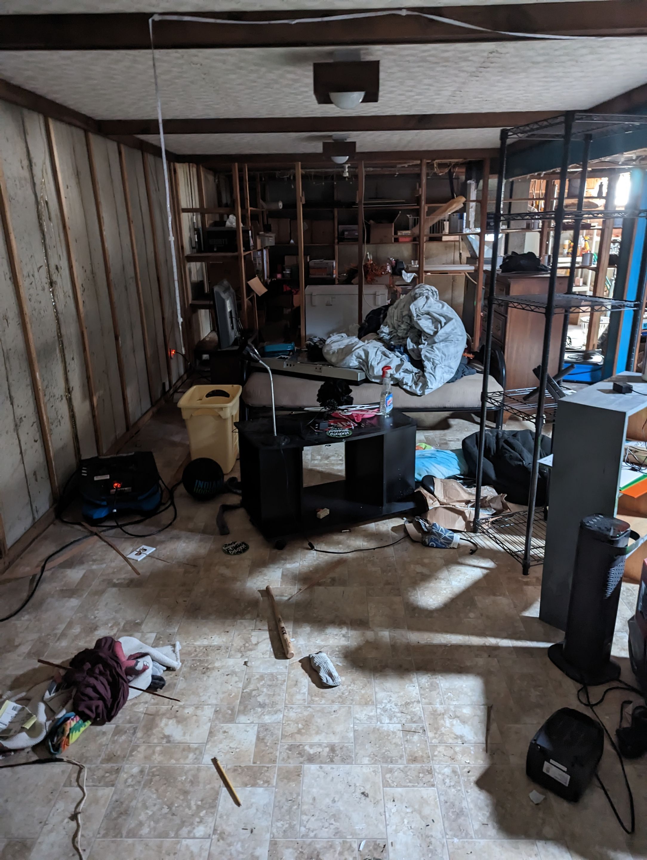 Water Damage in from upstairs sewage backup.  by ANR Restoration