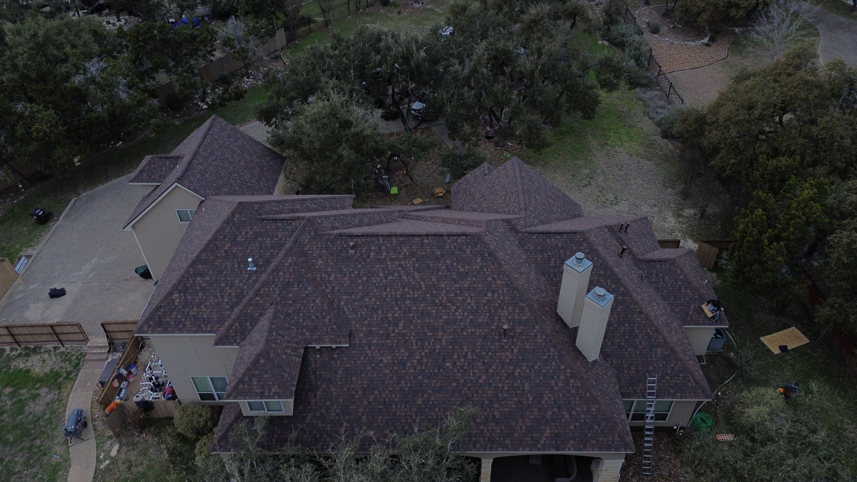 Residential Roof Replacement using 30 Year Laminate Shingles with High Profile Ridge by Premier Roofing and Contracting
