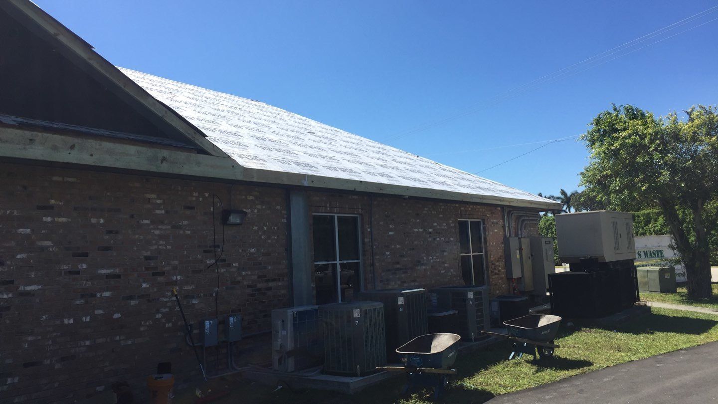 Residential Roofing Installation using 1.5'' Mechanical Seam by BLUES BROTHERS ROOFING