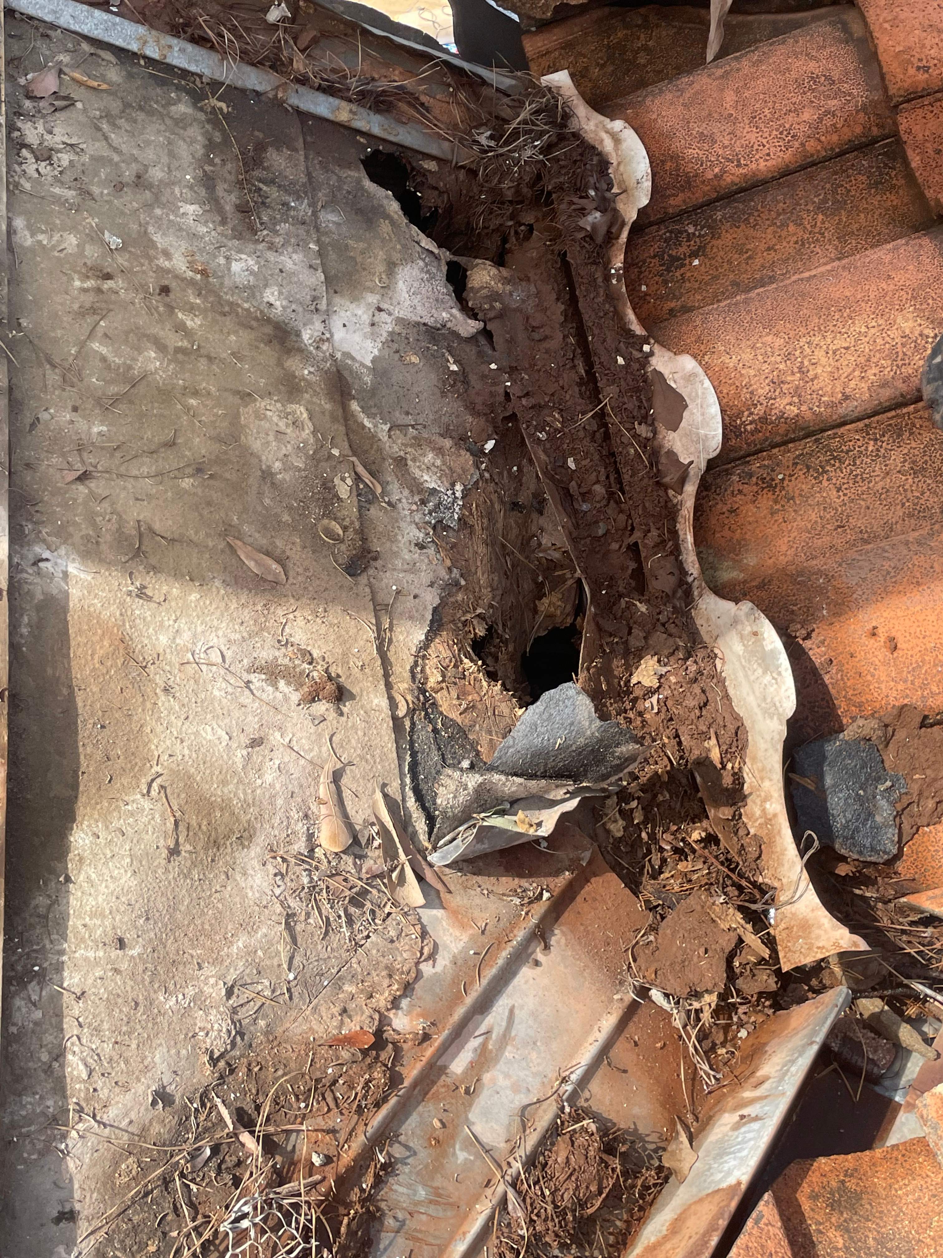 Dead Valley Repair on a Tile Roof by Associates Roofing Unlimited