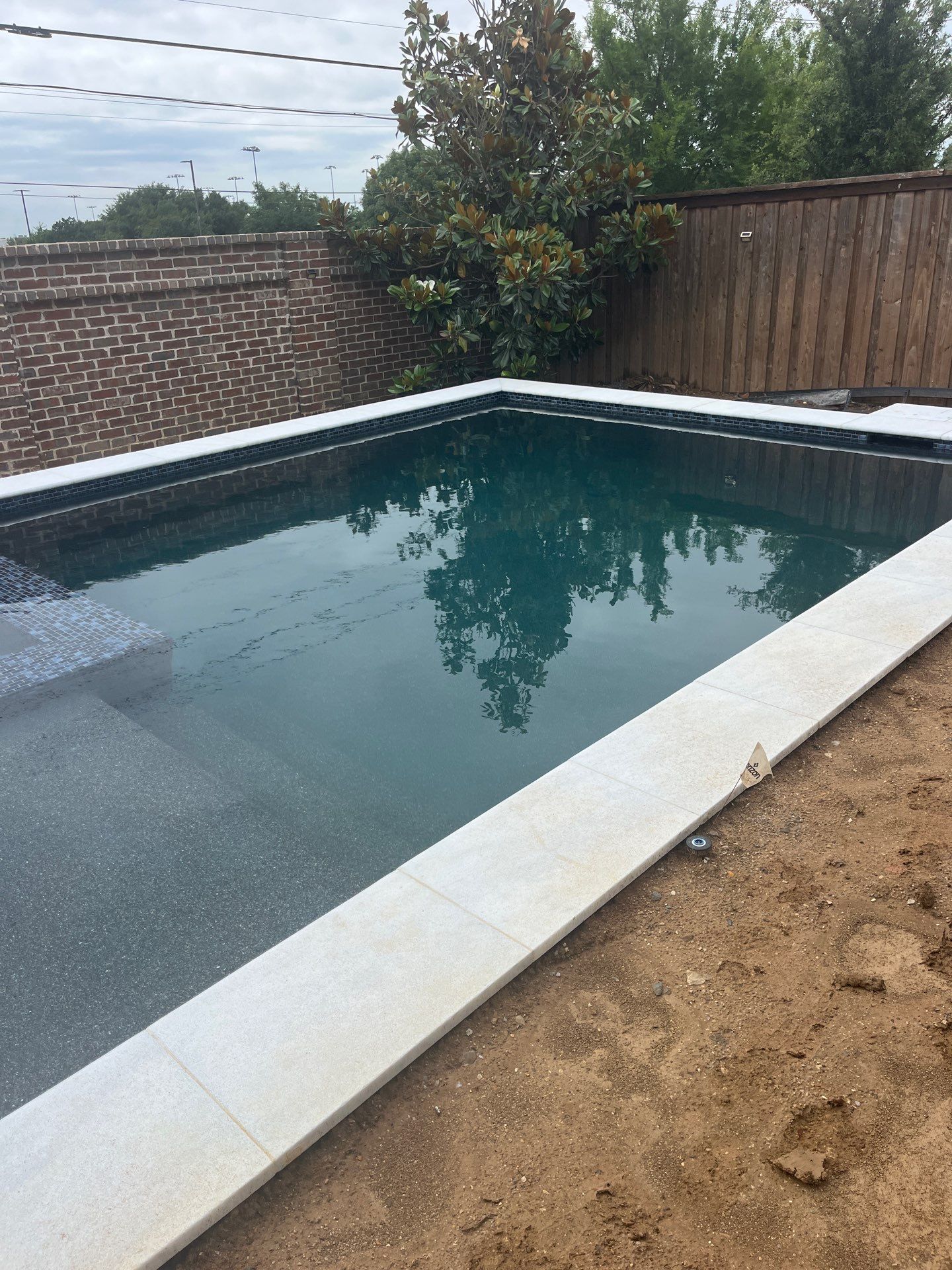 Modern Geometric Pool with Raised Spa and Turf Surround by Pinnacle Pools and Spas - DFW