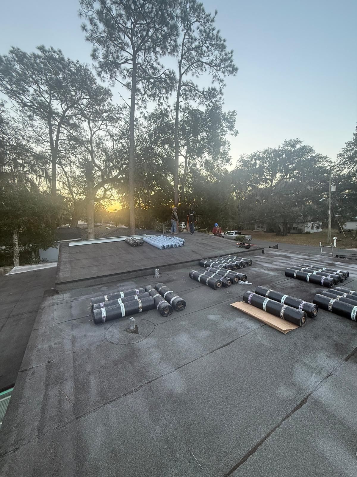 Flat Roof Renovation Due to Water Accumulation by urban green energy llc