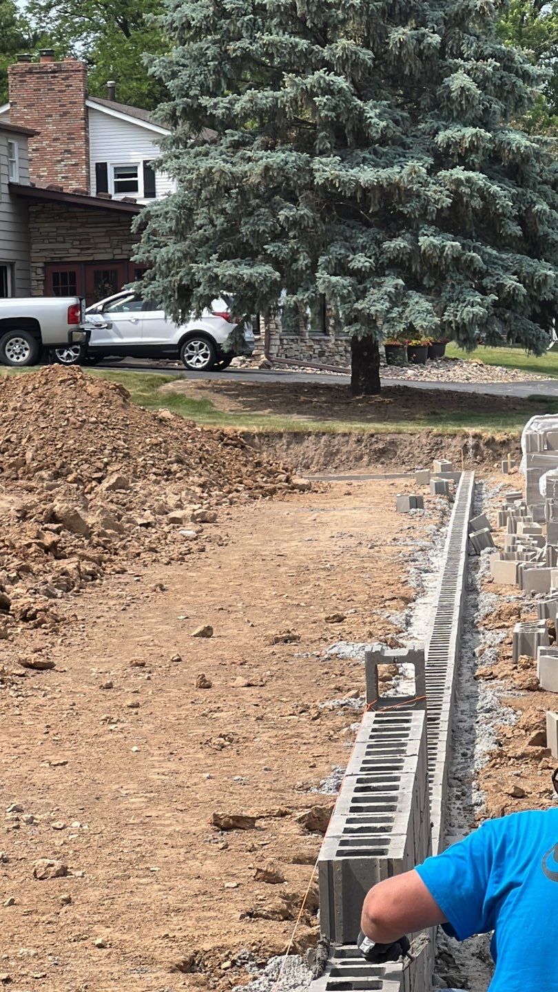 Fence / Retaining Wall using Block then parge by ACE Waterproofing & Basement Solutions