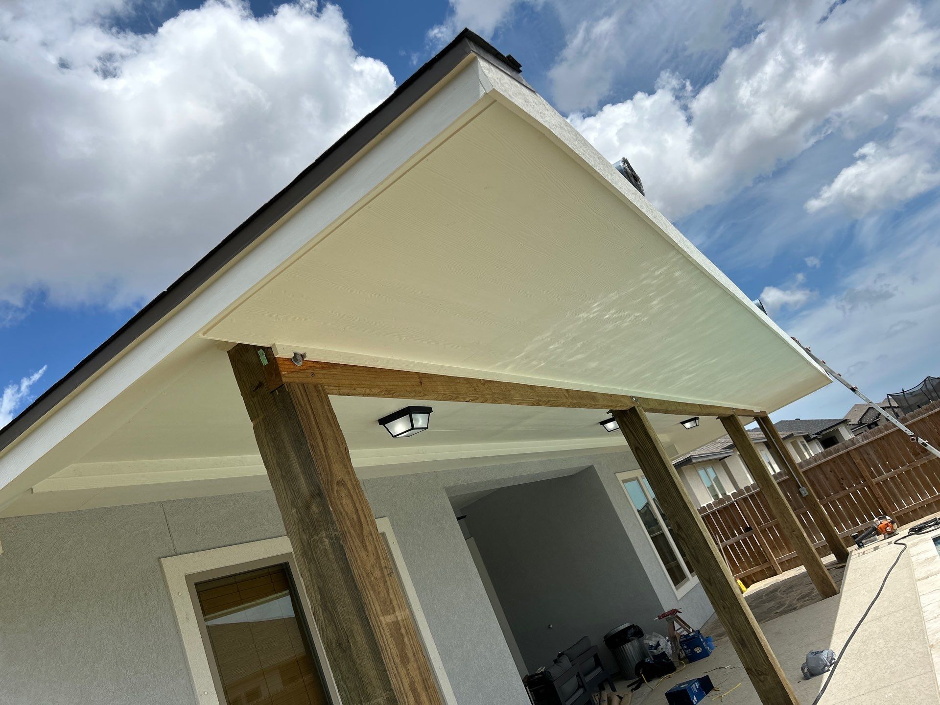 Patio Pool Cover by Bayfront Roofing and Construction