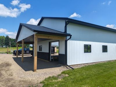 6" Black Seamless Gutters and Downspouts Loretto, MN 