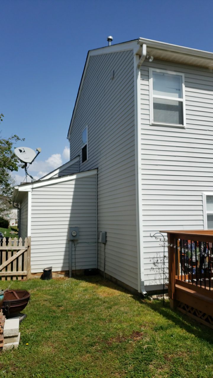 House Wash using cleaner by Power Wash Masters LLC