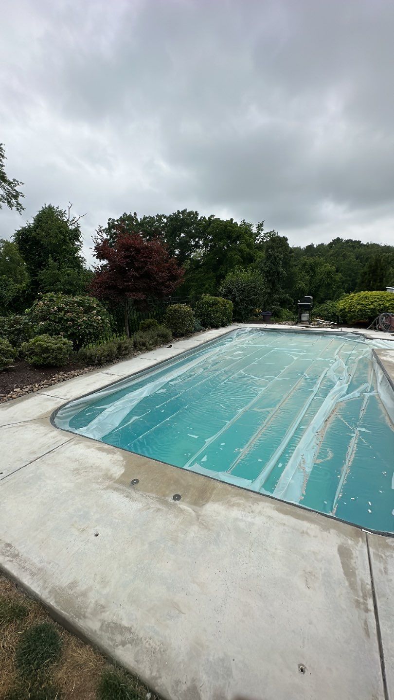 Pool Deck + Driveway + Garage Project in Venetia by Floors in a Day, Inc