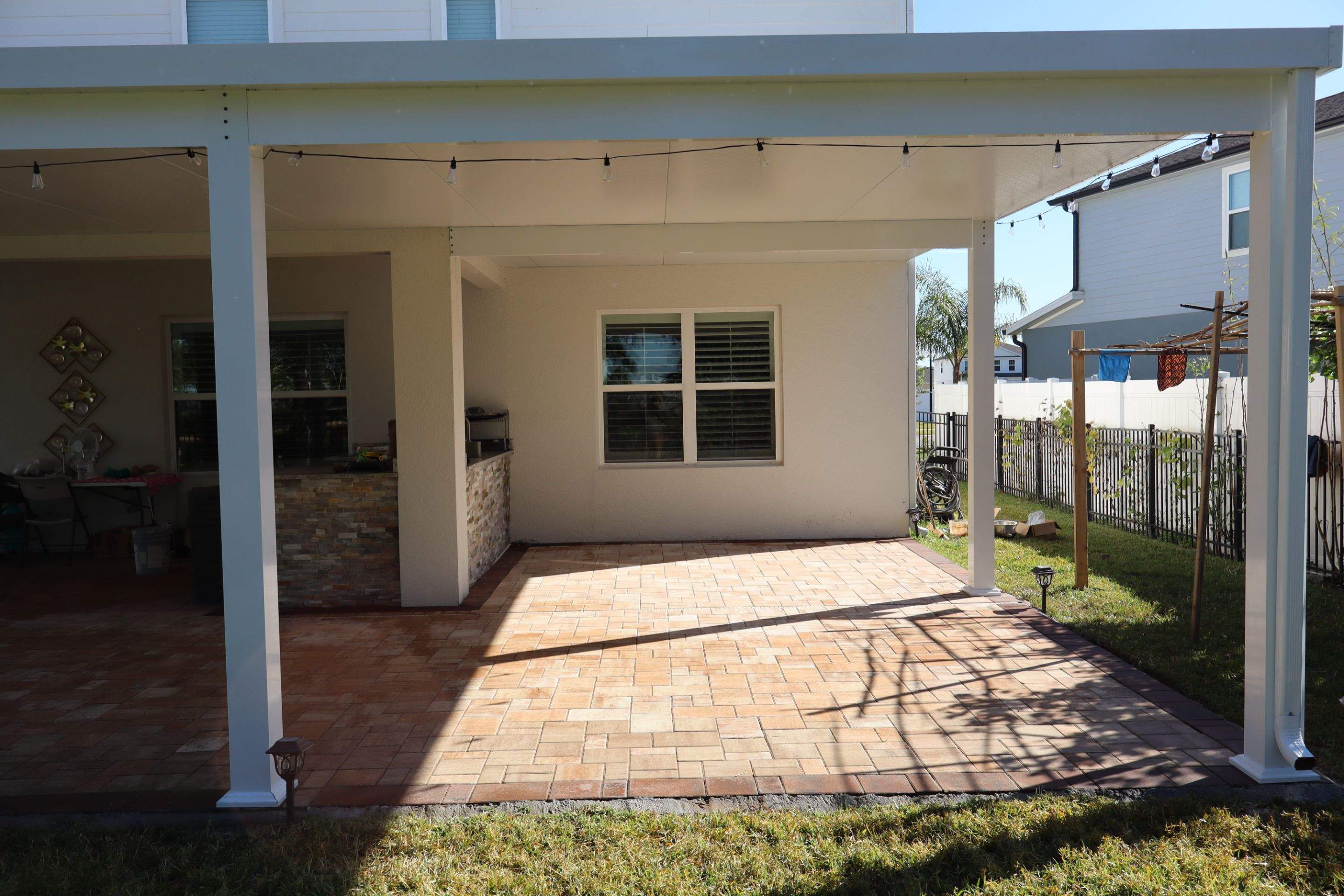 Patio cover with kitchen by Orlando pergolas 