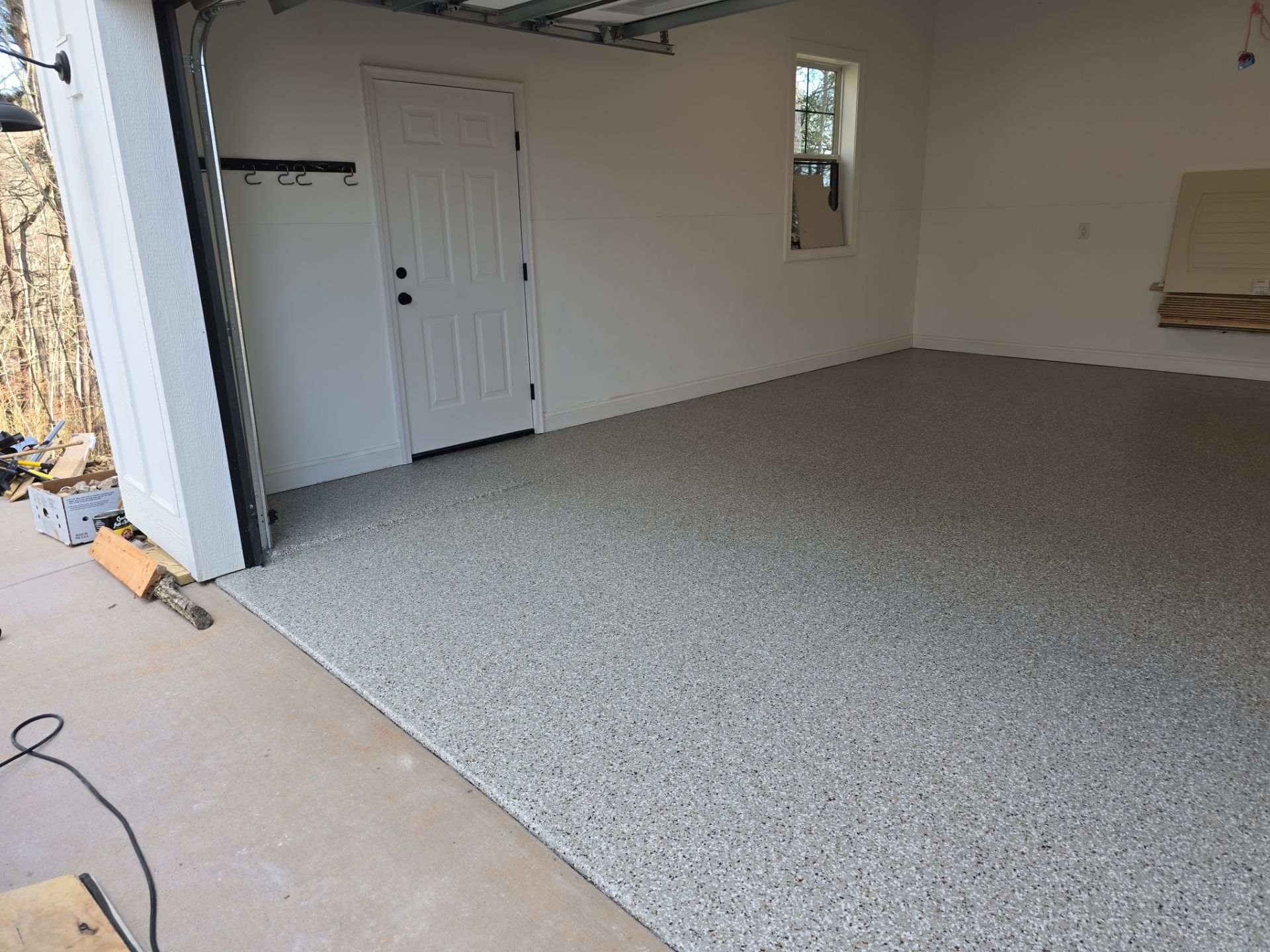 Garage using Creekbed by Elite Floor Solutions