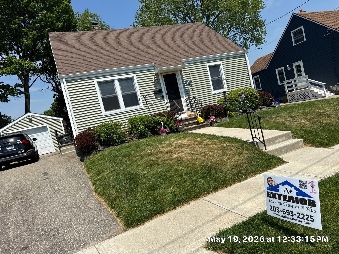 New Vinyl Siding Installation for Milford Home and Detached Garage by A Plus Exterior