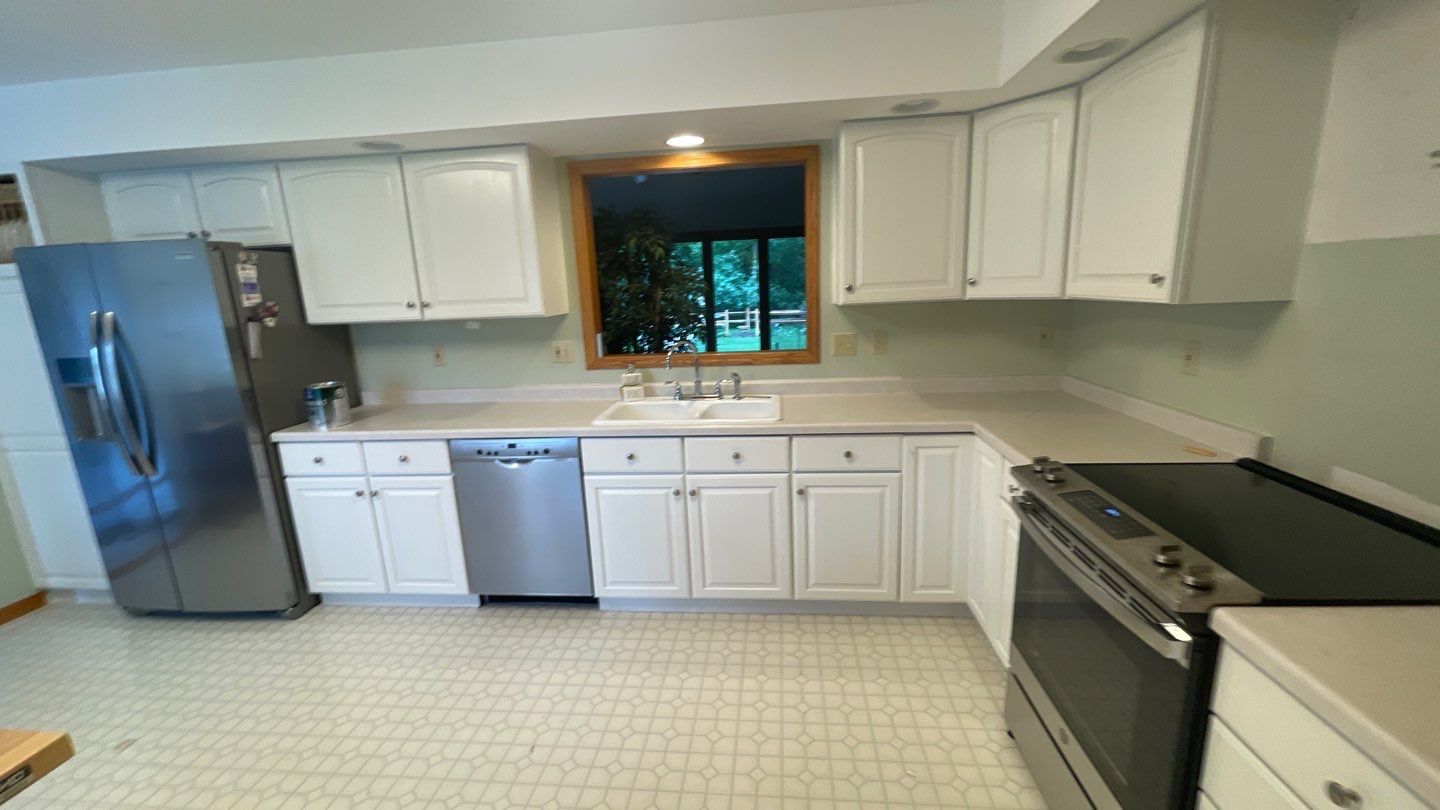 Cabinet Repaint by Cutting edge painting 