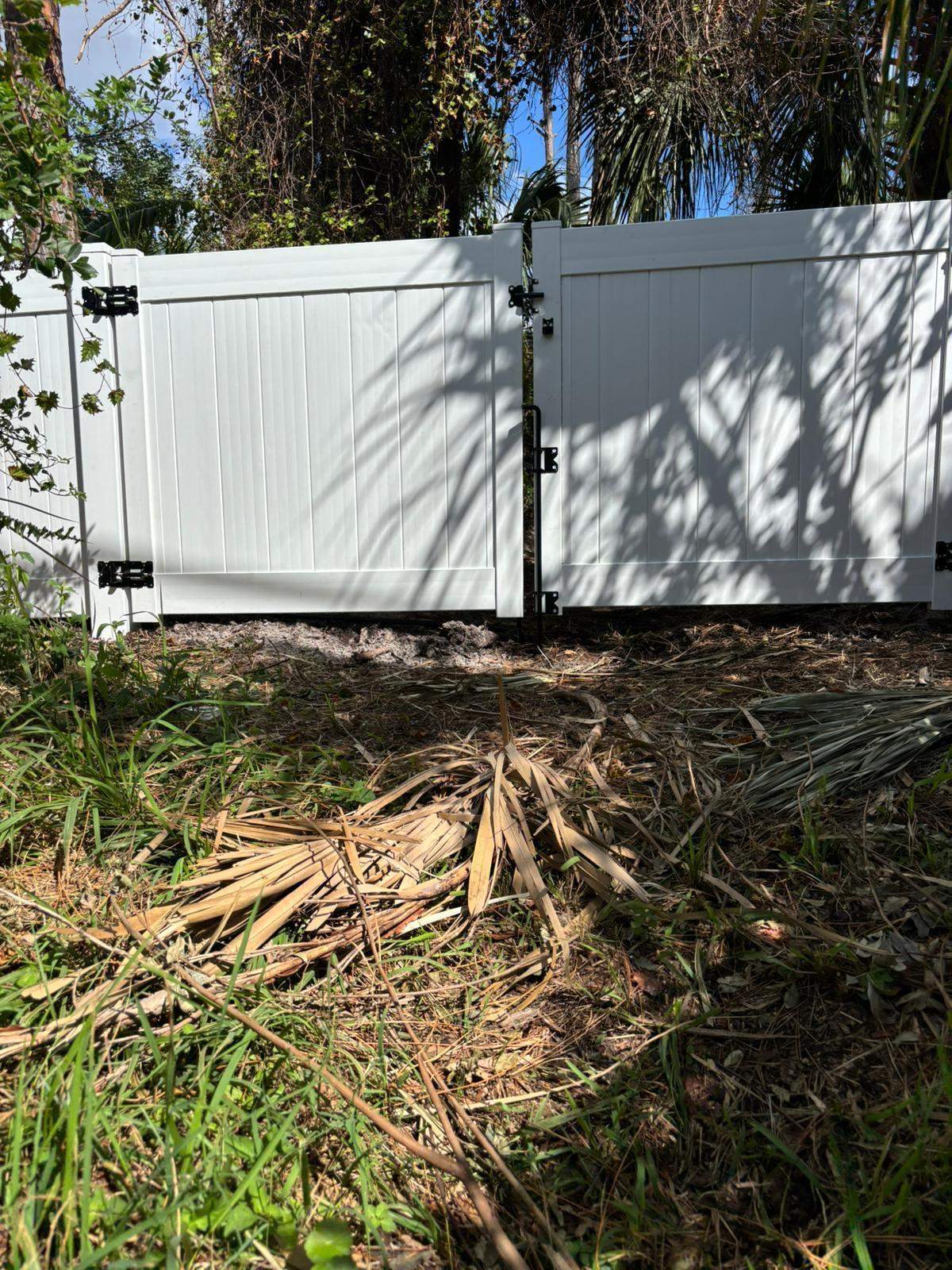 White Vinyl Privacy Fence and Gate Installation in North Port by True Fence LLC