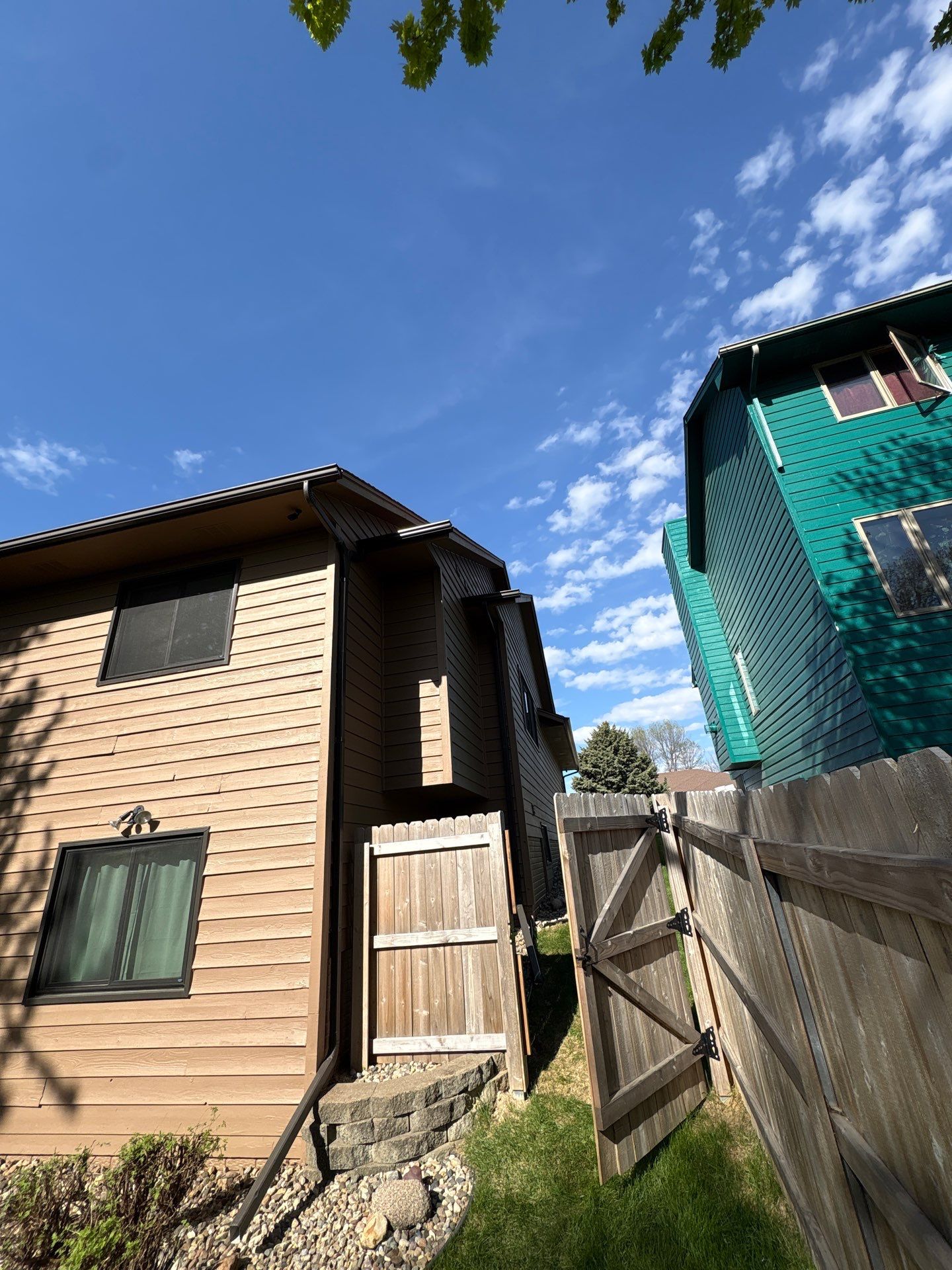 Wood Siding Restoration and Exterior Painting in Sioux Falls by Select Painting, Coatings & Garage Cabinets