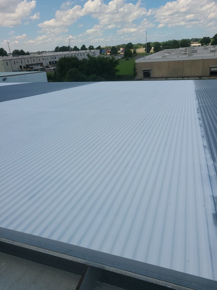 Commercial Metal Restoration System using Aldocoat Coatings by Hostetler Roofing
