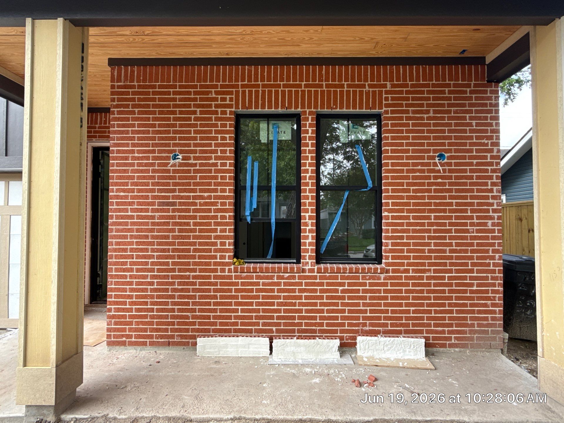 Midtown Elegance: Brickwork with Slurry Finish Refinement by Apex Conventional Stucco Llc